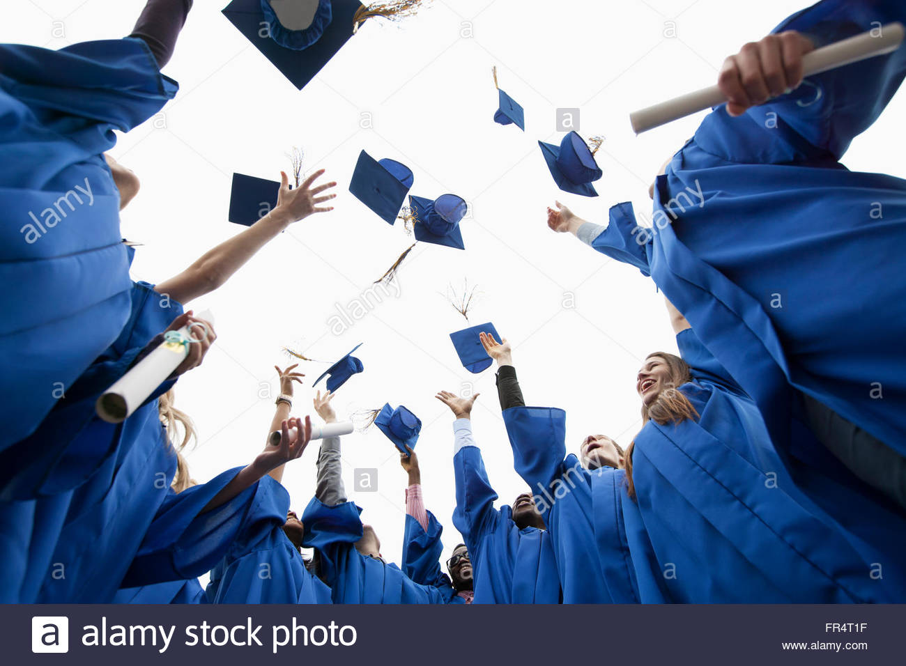 Graduation caps in the air hires stock photography and images Alamy
