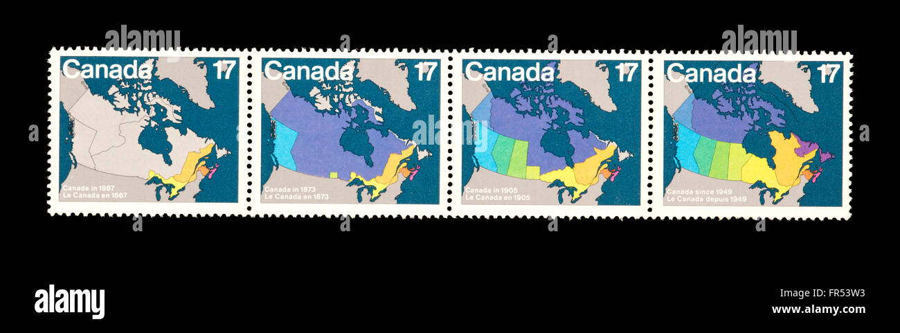 Postage stamps from Canada depicting the expansion of Canadian provincial boundaries (1867, 1873, 1905 and 1949) Stock Photo