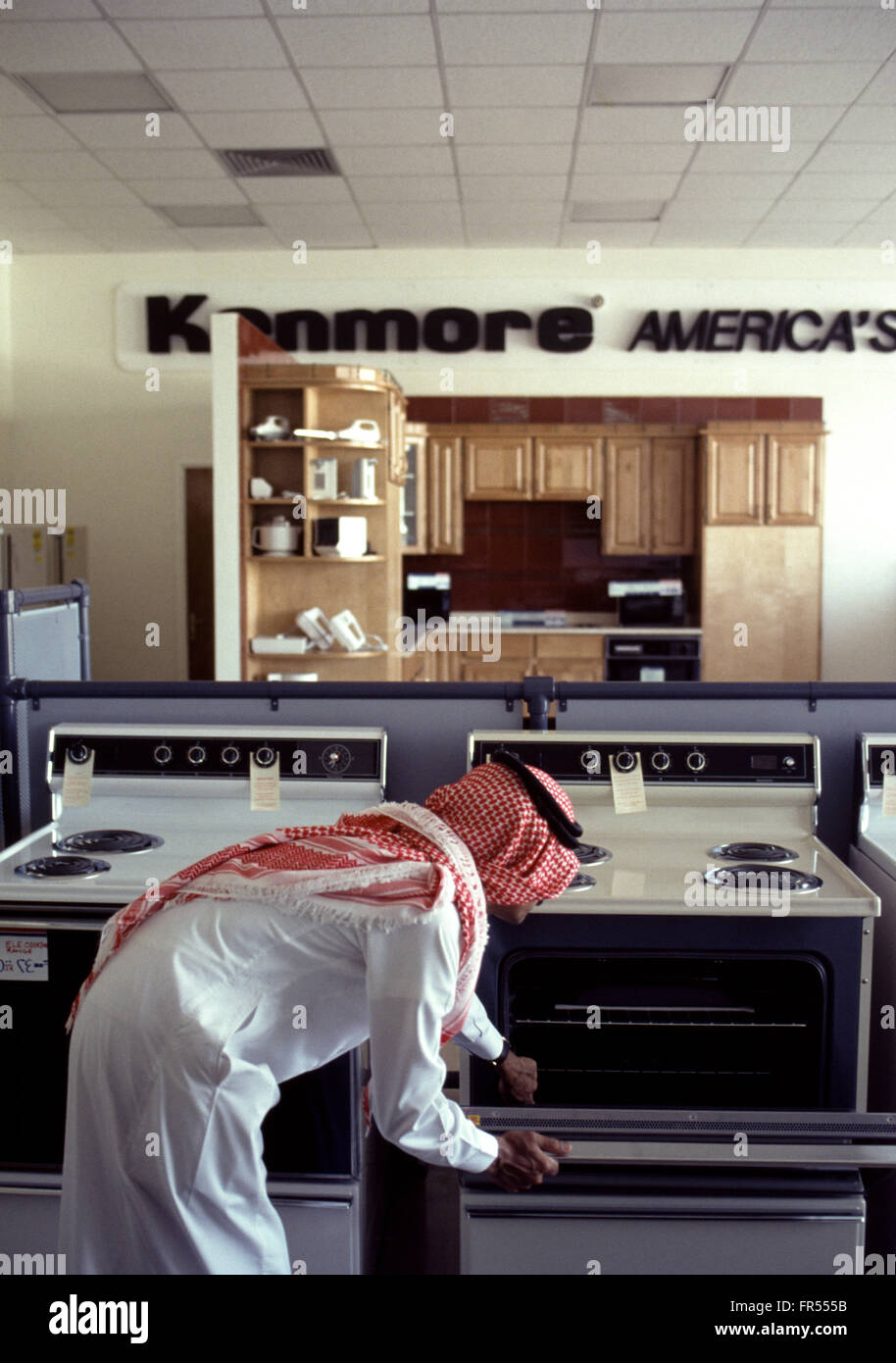 A Saudi man shopping in a Sears shop in Dammam. Stock Photo