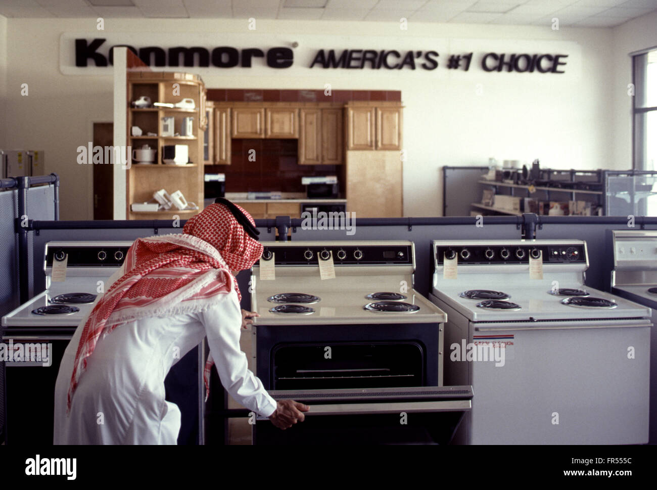A Saudi man shopping in a Sears shop in Dammam. Stock Photo