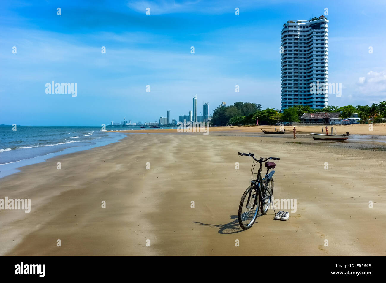 Empty beach with bicycle Stock Photo
