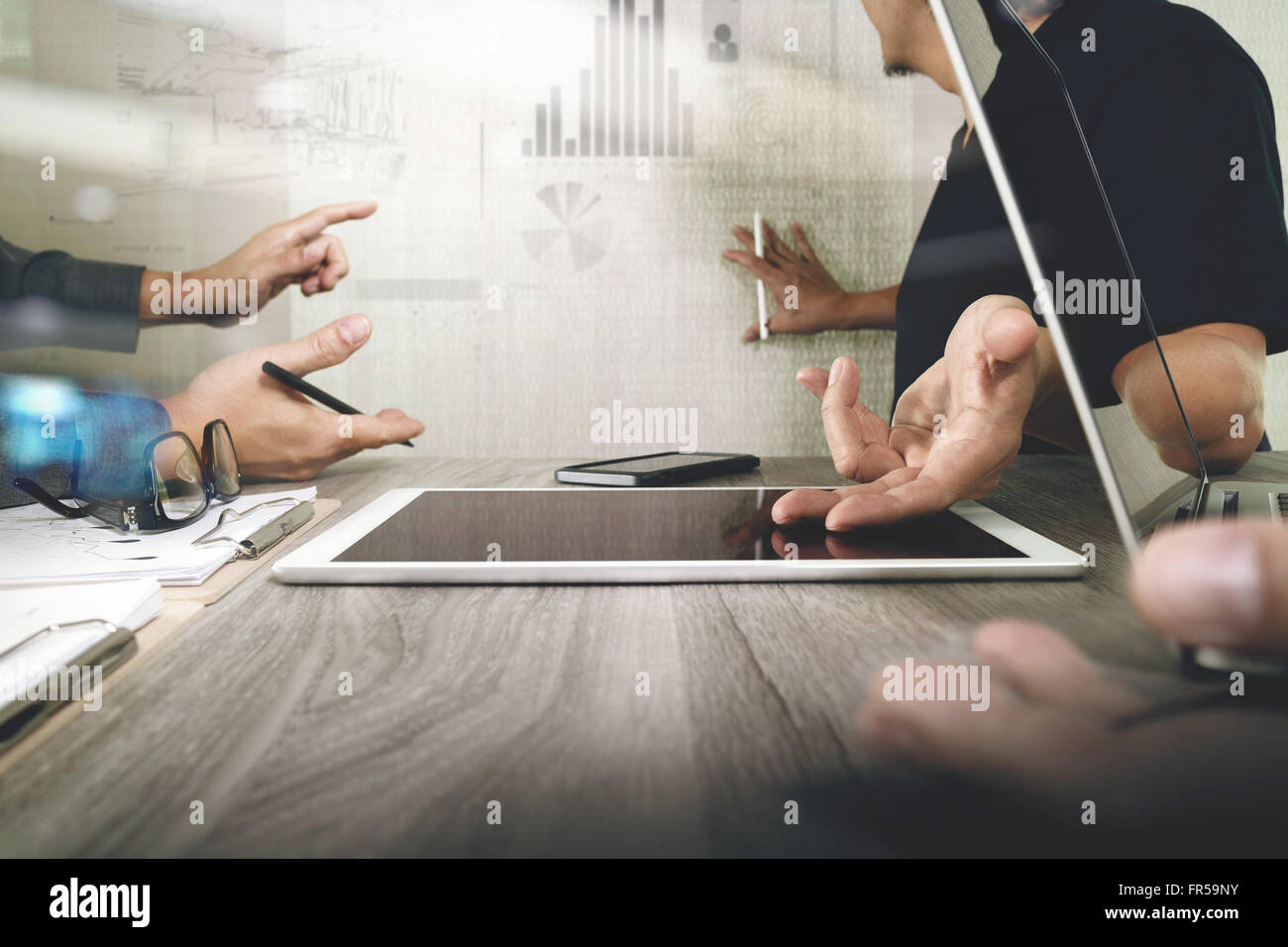 Businessman making presentation with his colleagues and business ...