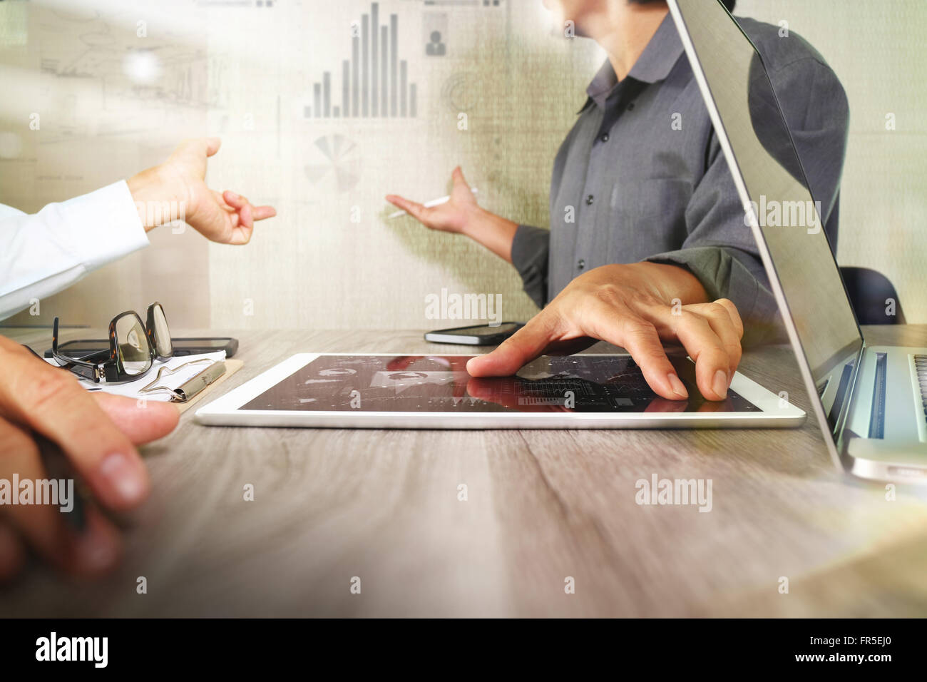 Businessman making presentation with his colleagues and business ...