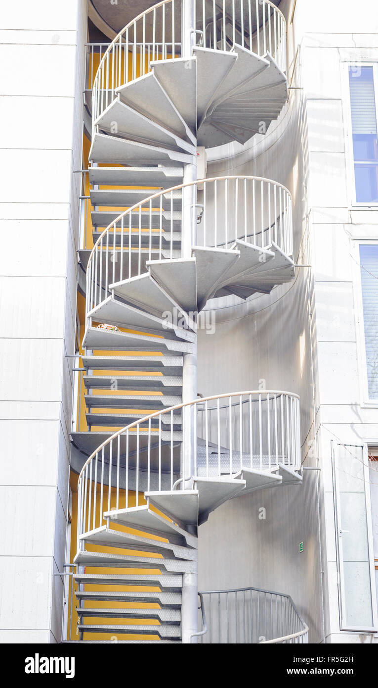 Spiral staircase serving as fire escape .Emergency exit outside
