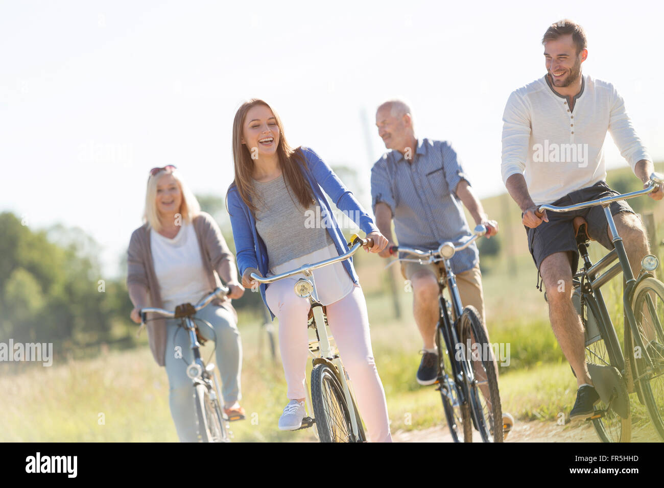 Happy young family four hi-res stock photography and images - Alamy