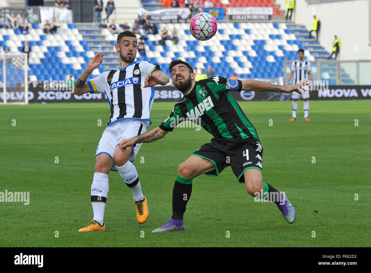 Reggio Emilia, Italy. 20th Mar, 2016. Bruno Miguel Borges Fernandes Udinese's midfielder and national team of Portugal and Francesco Magnanelli Sassuolo midfielder fight for the ball during the Serie A football match between US Sassuolo Calcio and Udinese Calcio at Mapei Stadium in Reggio Emilia. Udinese wins over Sassuolo 1-0. © Massimo Morelli/Pacific Press/Alamy Live News Stock Photo
