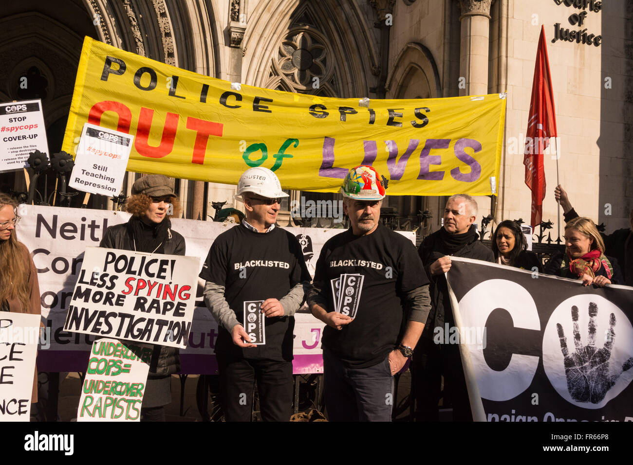 London UK 22nd March 2016. Supporters of women deceived into long term intimate relationships with undercover police officers, and blacklisted construction workers gather outside the Royal Courts of Justice in a solidarity picket at the start of a preliminary hearing into a Public Inquiry into Undercover Policing. The preliminary hearing will determine how the inquiry will be conducted. Police authorities have asked that the public inquiry keep some evidence secret, but the legal teams of the women who are taking action argue that all evidence should be examined in public. ©Patricia Phillips/A Stock Photo