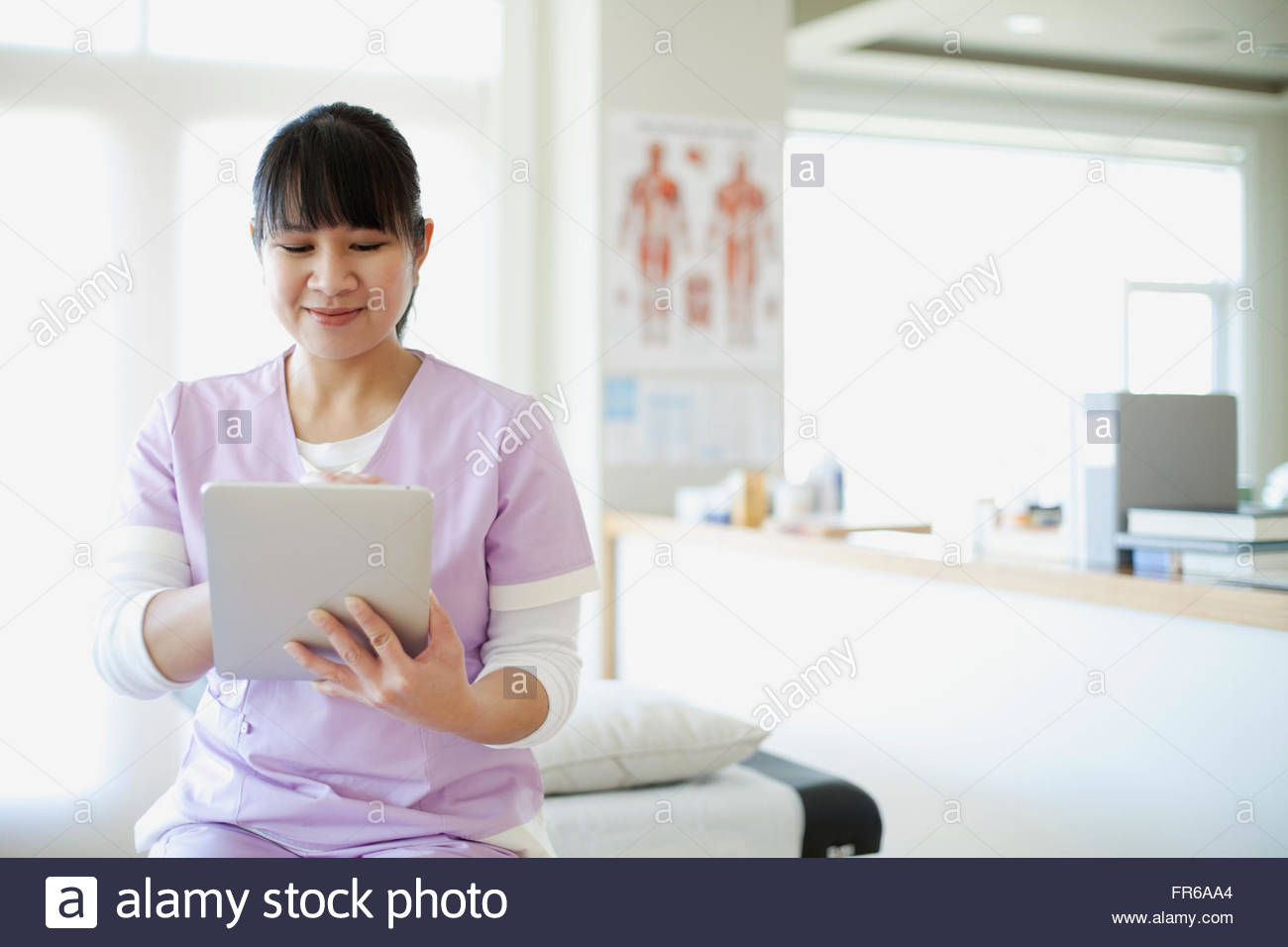 pretty assistant at medical clinic Stock Photo