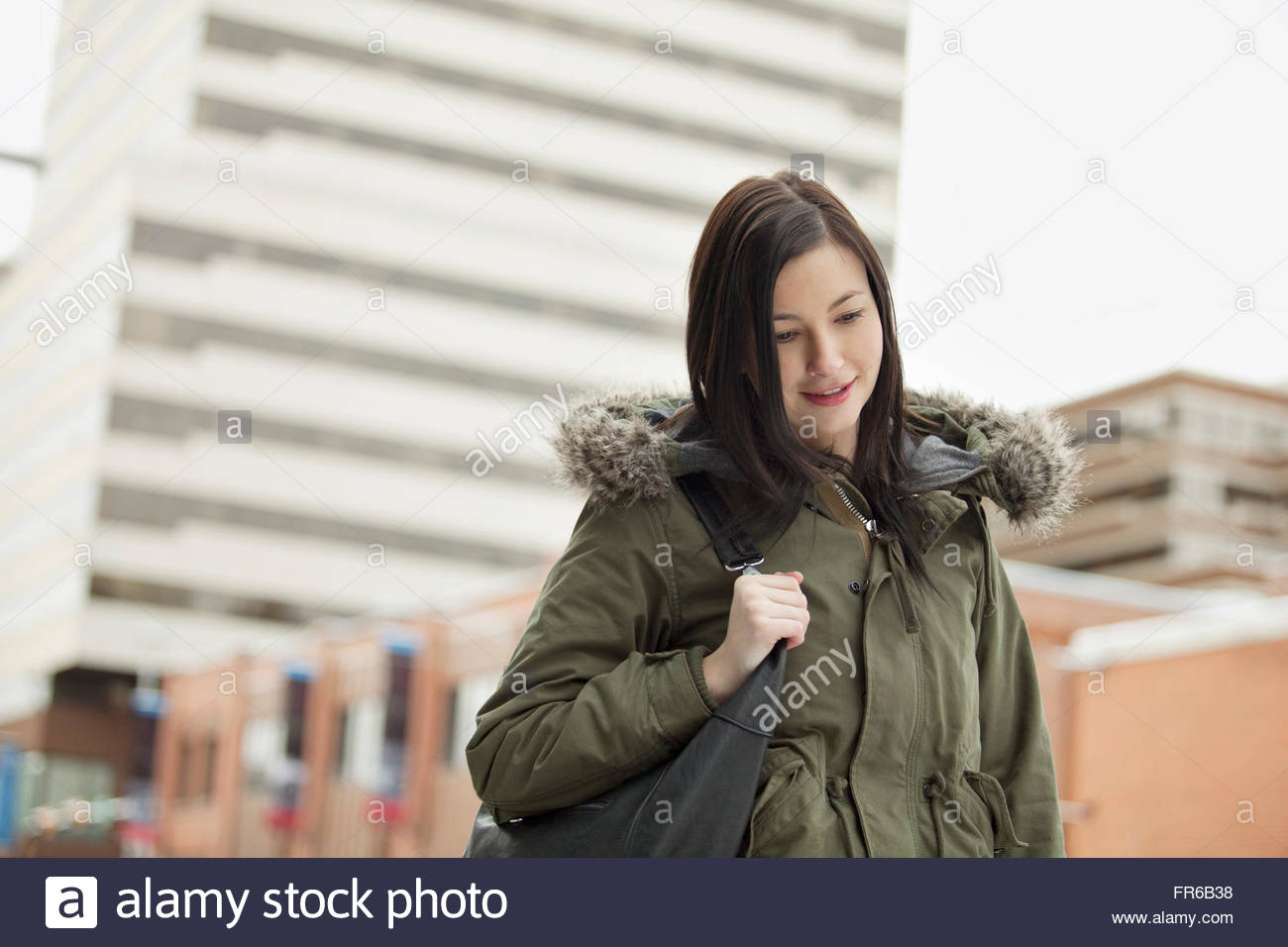 young woman out for a brisk walk Stock Photo