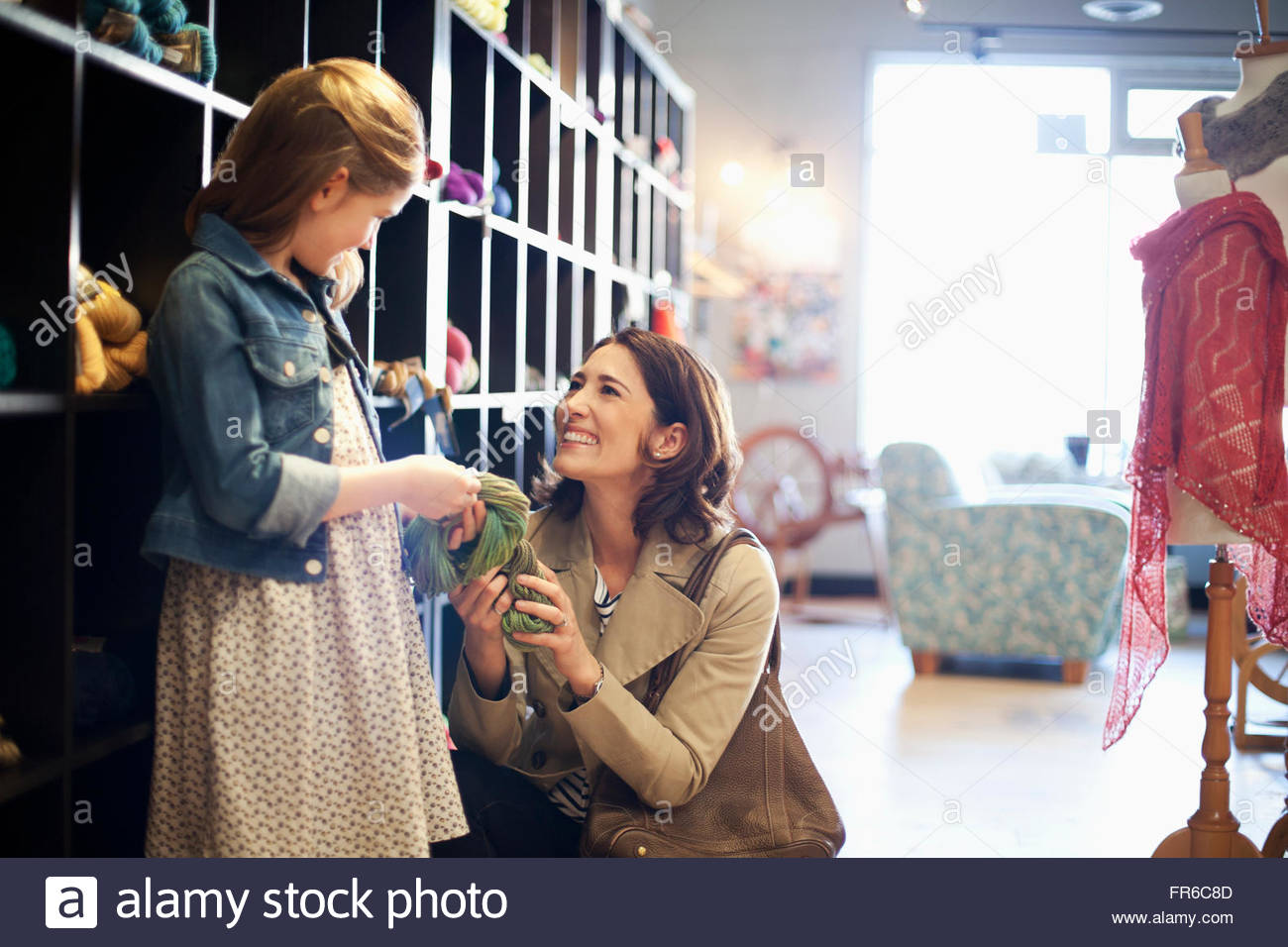 Mom and daughter choosing yarn hires stock photography and images Alamy