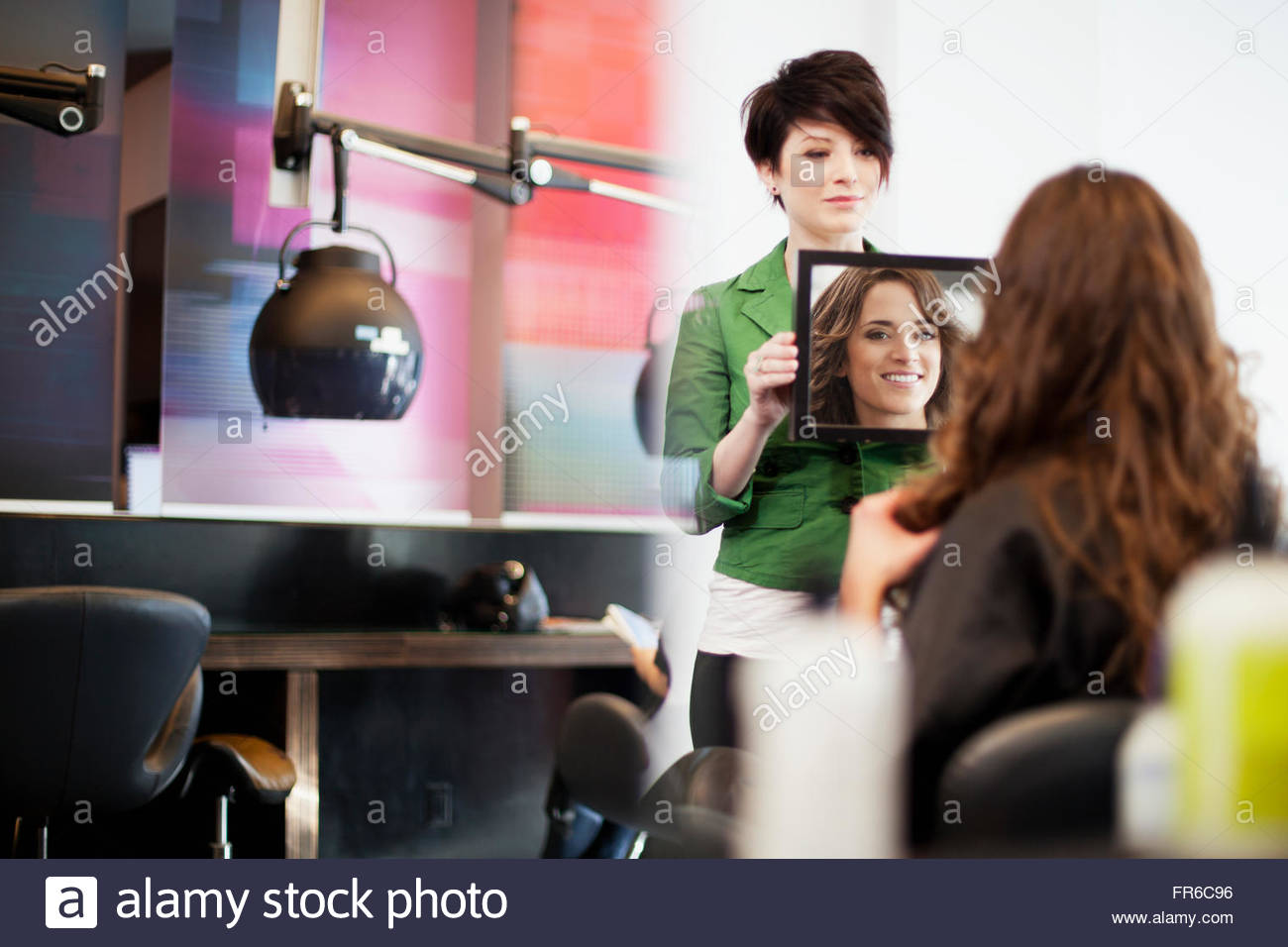 hairstylsts working at hair salon Stock Photo