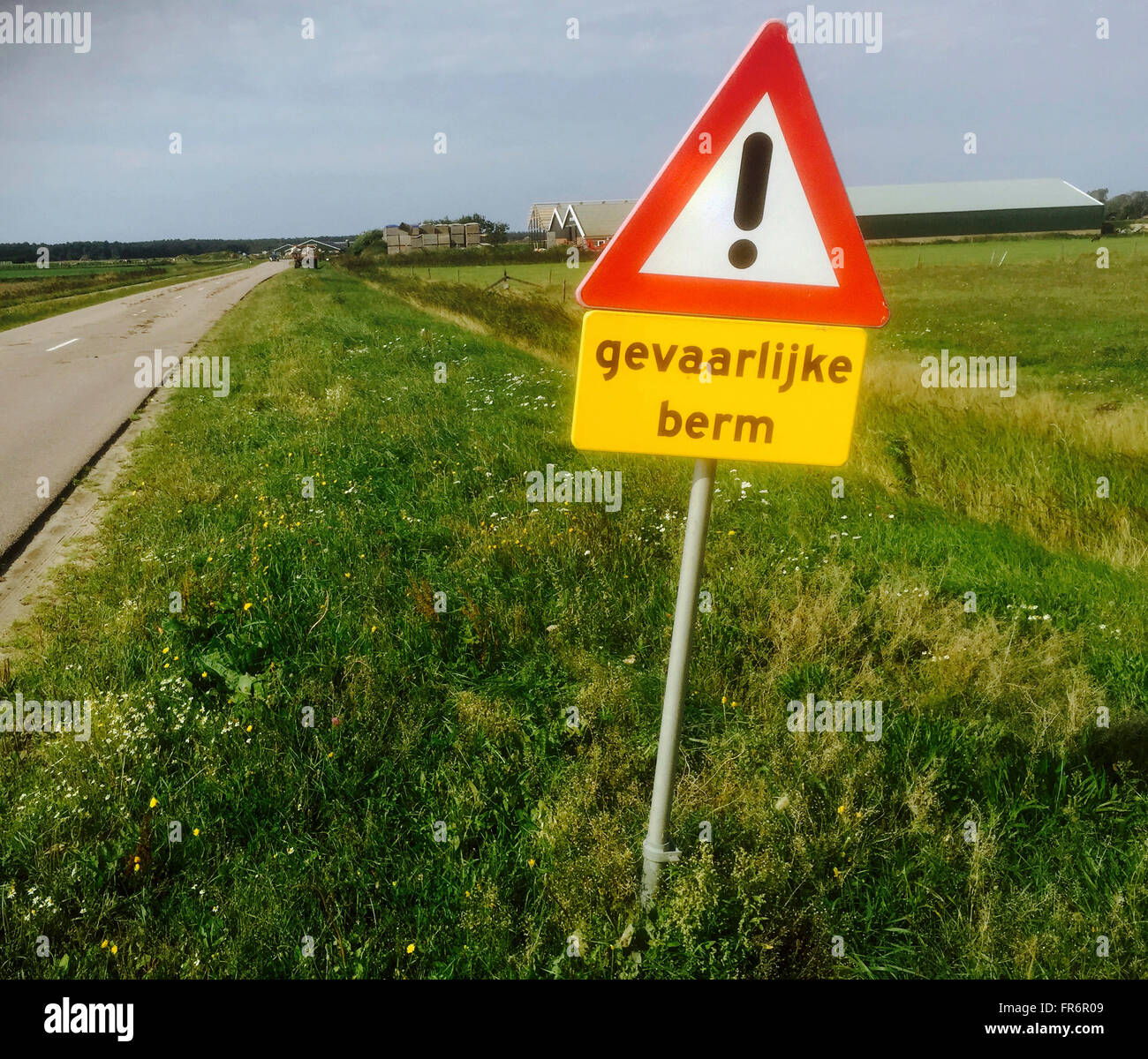 signboard 'DANGER' in Dutch Stock Photo