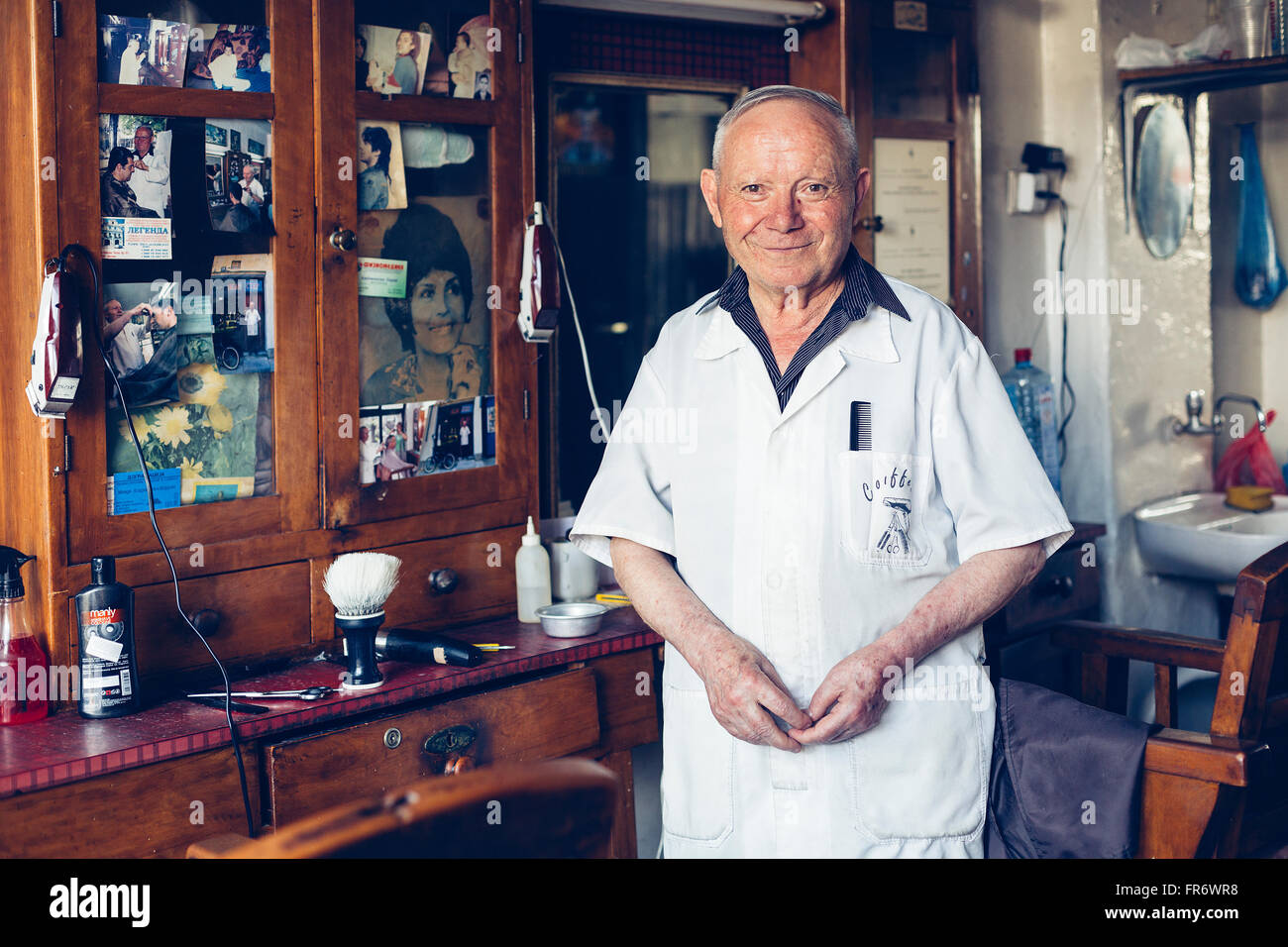 Republic of Macedonia, Bitola, the city center, portrait of a barber in barbershop Stock Photo