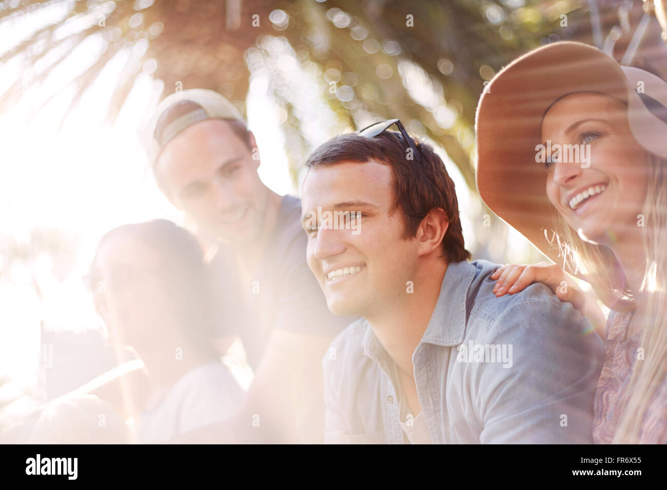 Friends smiling summer outdoors Stock Photo