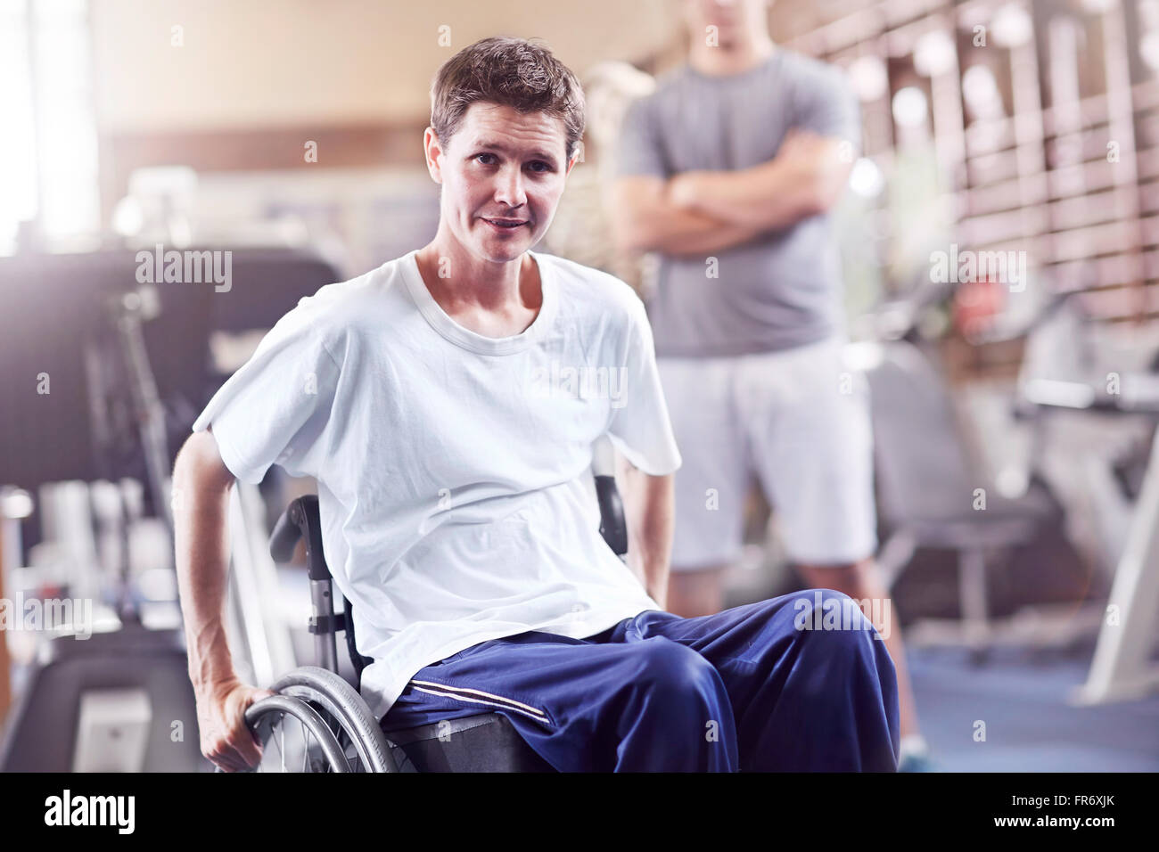 Portrait man in wheelchair at physical therapy Stock Photo