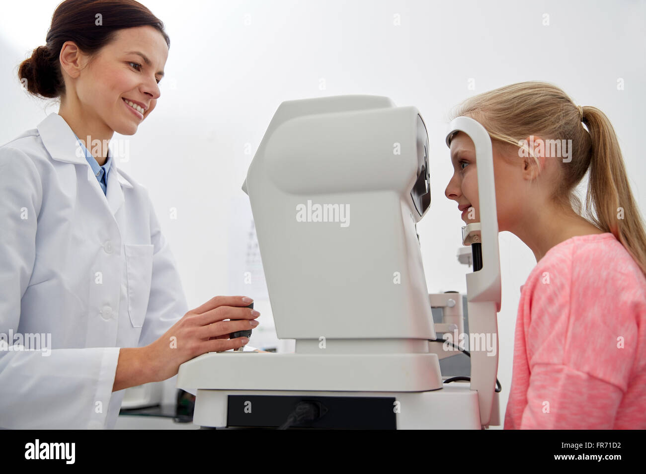 optician with tonometer and patient at eye clinic Stock Photo Alamy