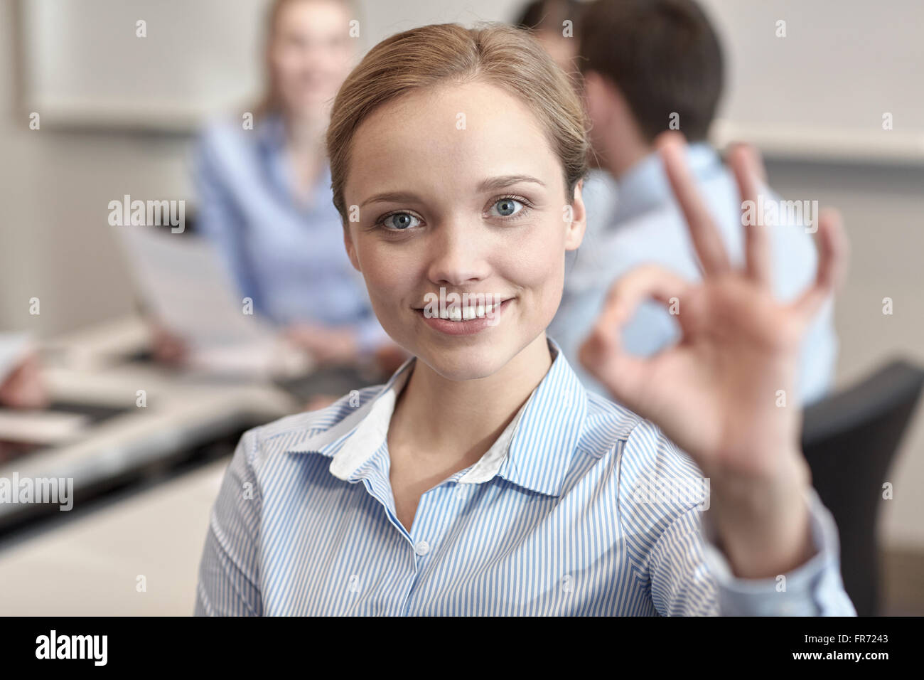 group of smiling businesspeople meeting in office Stock Photo - Alamy