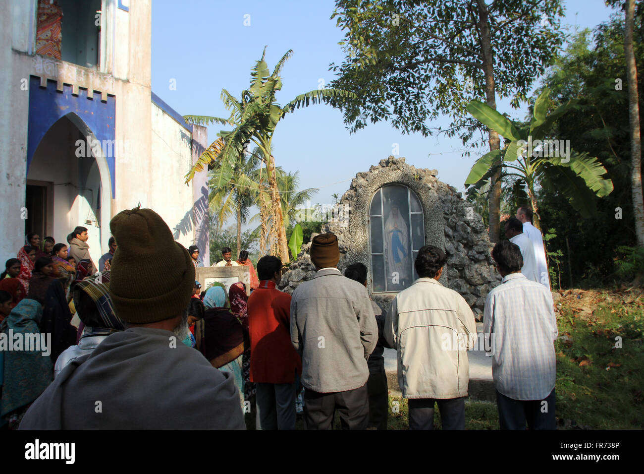 Prayer in front of Our Lady of Lourdes church in Baidyapur, West Bengal, India on December 02, 2012. Stock Photo