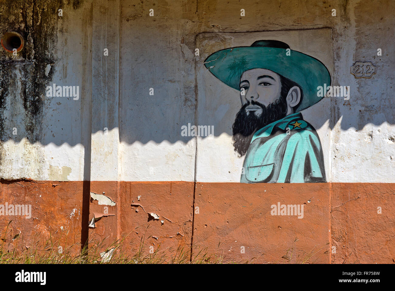 A picture of Cuban revolutionary Camilo Cienfuegos, painted on a wall in Havana, Cuba. Stock Photo