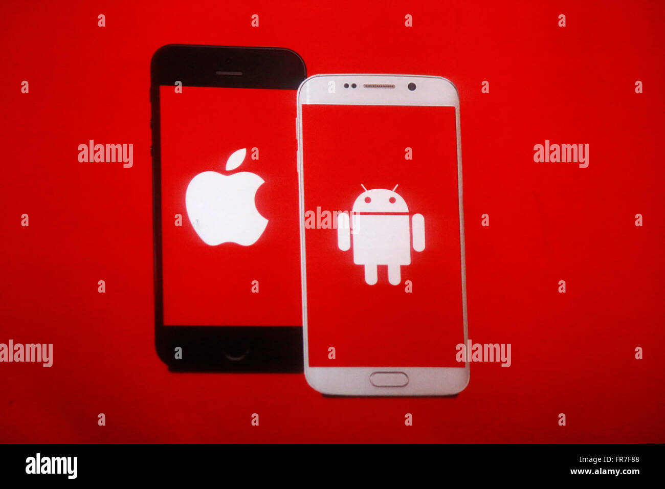 Symbolbild fuer Smartphone !Apple' und 'Android', Berlin. Stock Photo