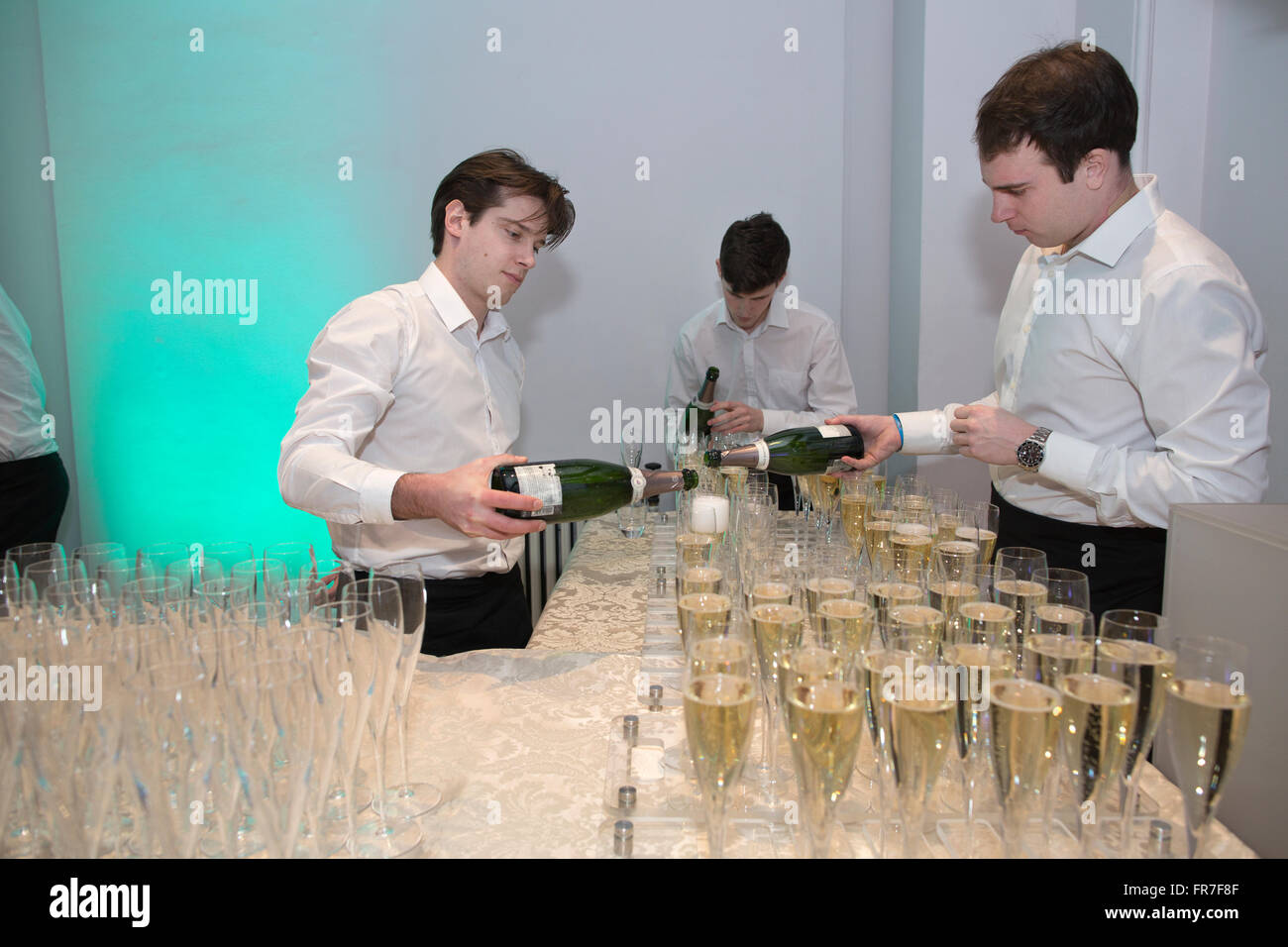 Champagne being poured in flutes, London, UK Stock Photo Alamy