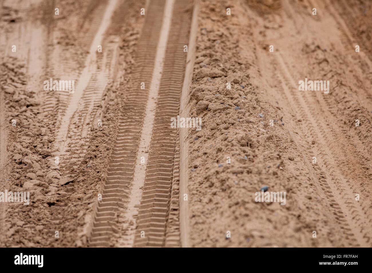 Tire tracks on the ground. Off road 4X4 wheel tracks on country desert