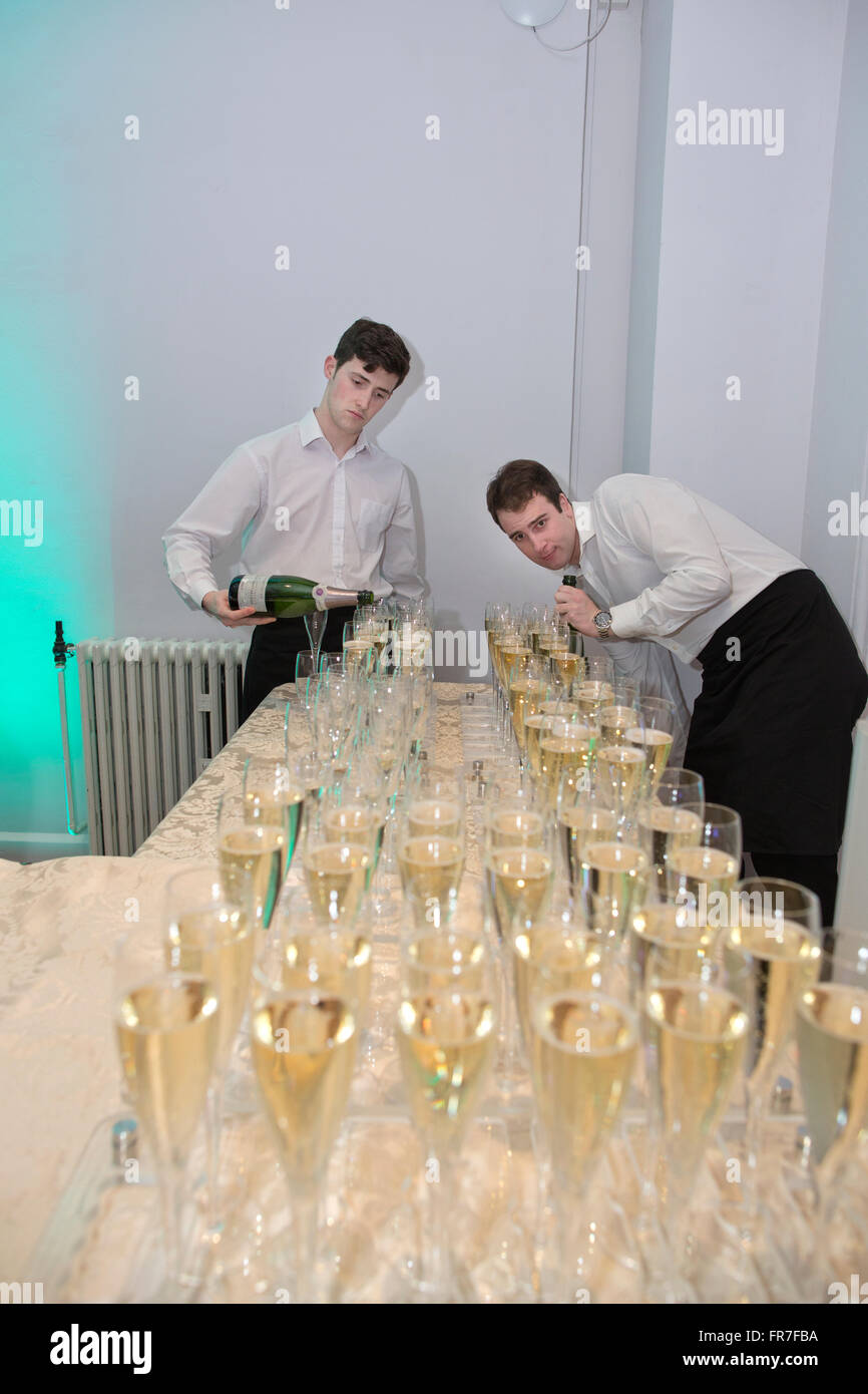 Champagne being poured in flutes, London, UK Stock Photo Alamy