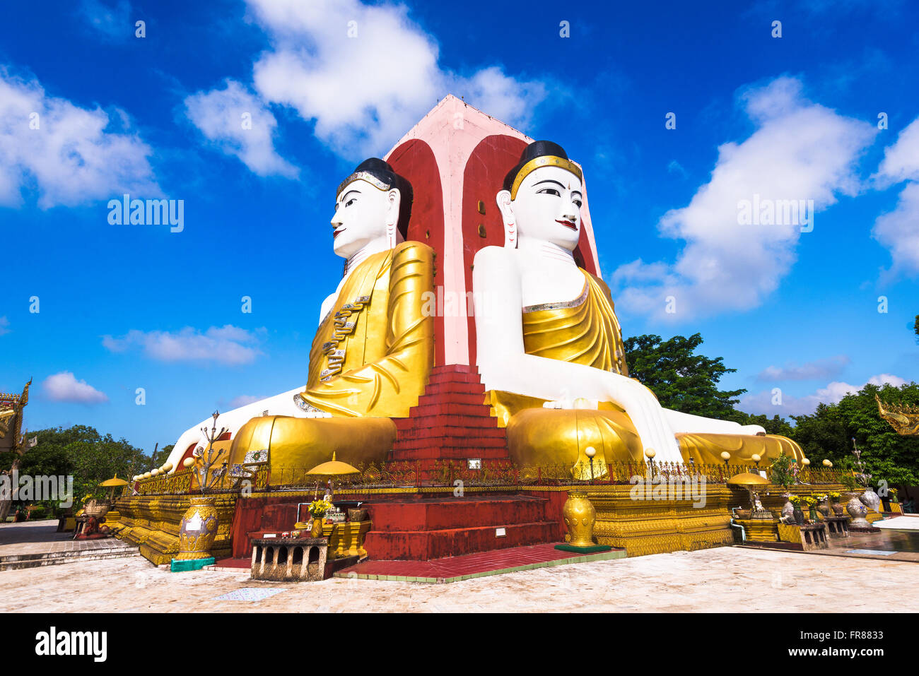 Bago, Myanmar Four Faces of Buddha at Kyaikpun Buddha. Stock Photo