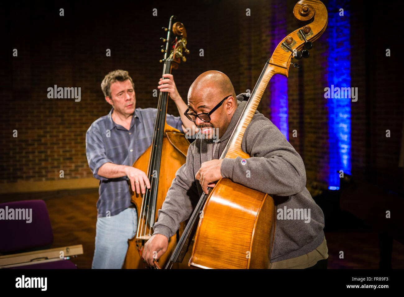 American bass players Christian McBride and Edgar Meyer at soundchecks together for their concert at the Turner Sims Concert Hal Stock Photo