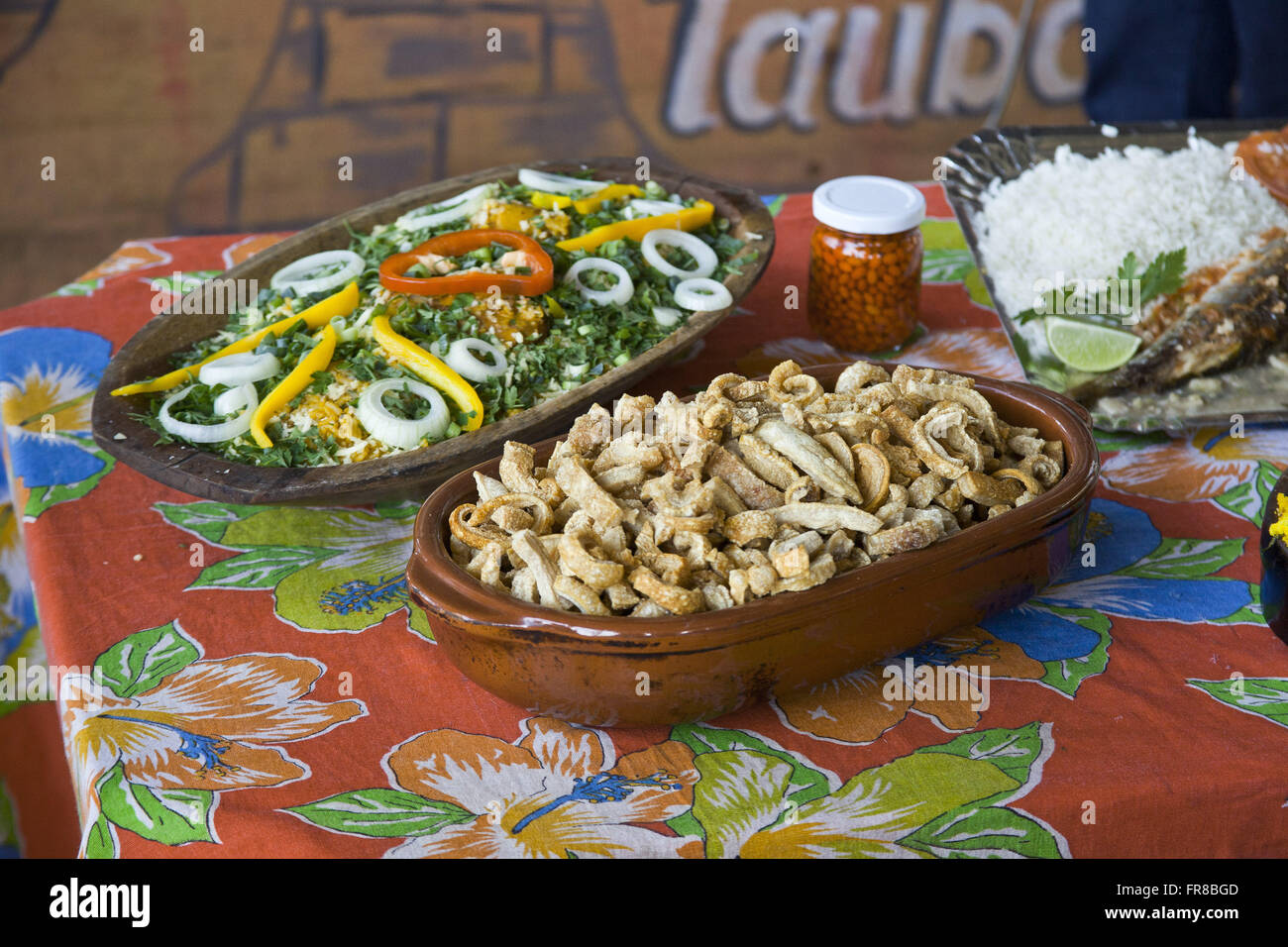 Crackling - cabbage - rice and glass pot with pepper - typical dishes of the interior of Sao Paulo Stock Photo