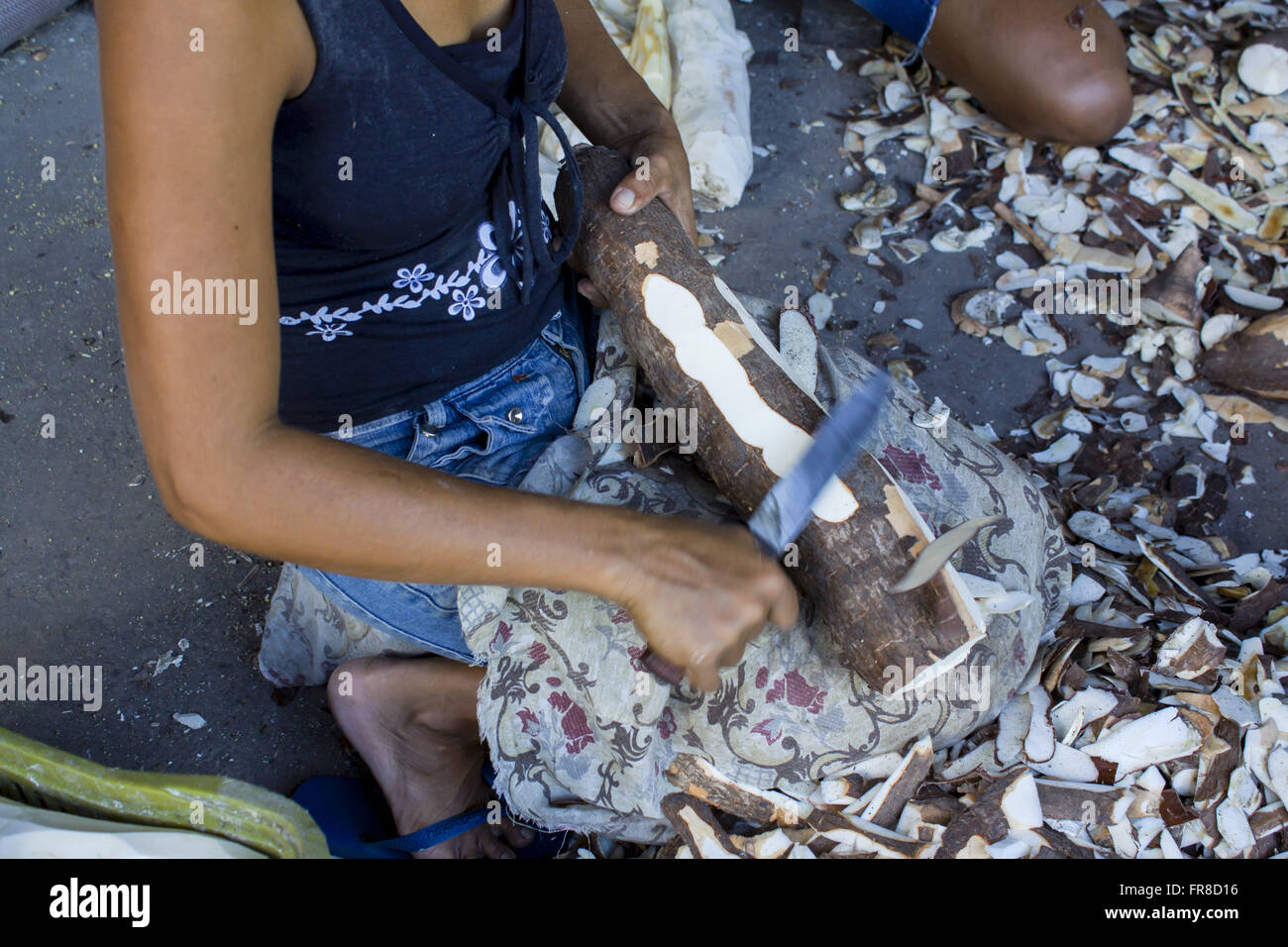 In the flour or home baked cassava and stripped by women from the community Stock Photo