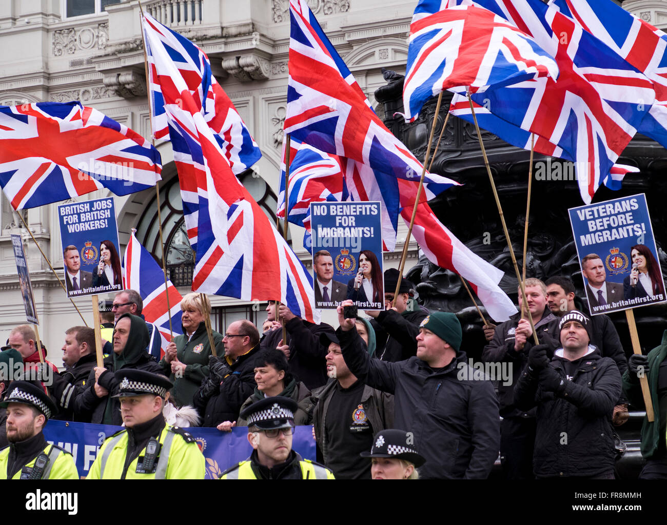 Britain First, a right wing racist group gather and try to disrupt the Stand Up against Racism March through London Stock Photo