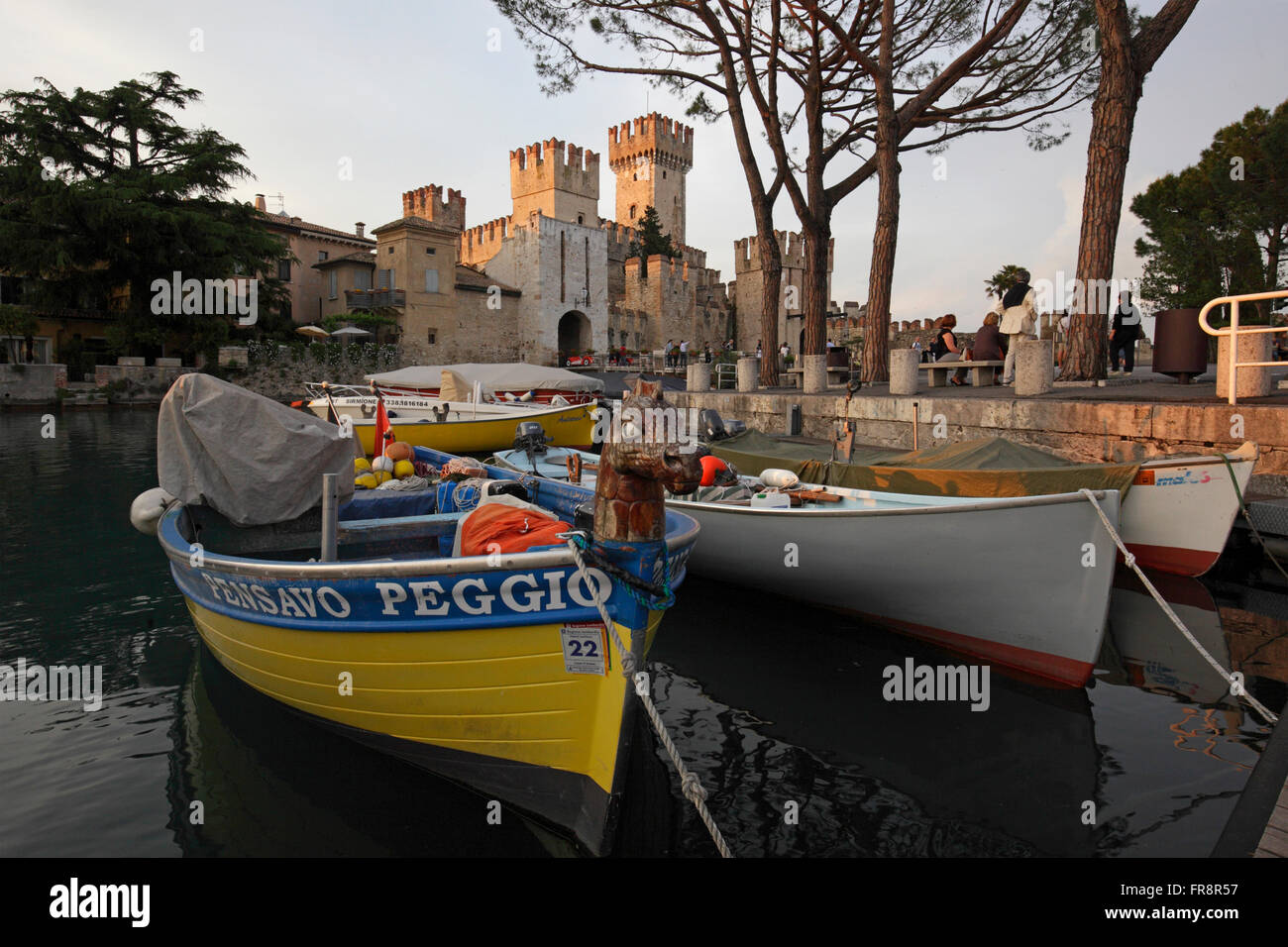 The little harbour with the scaliger castle of Sirmione, Italy Stock Photo