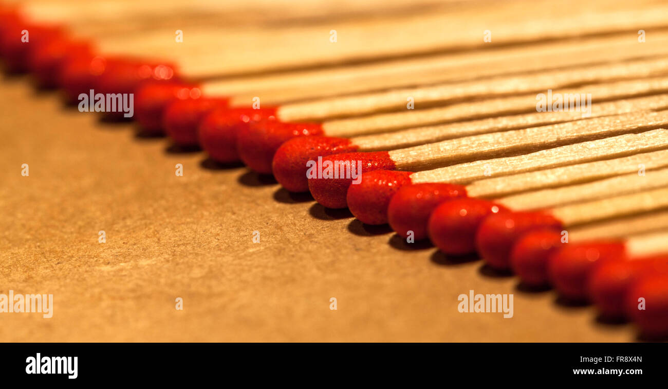 Matches aligned in a row. Stock Photo