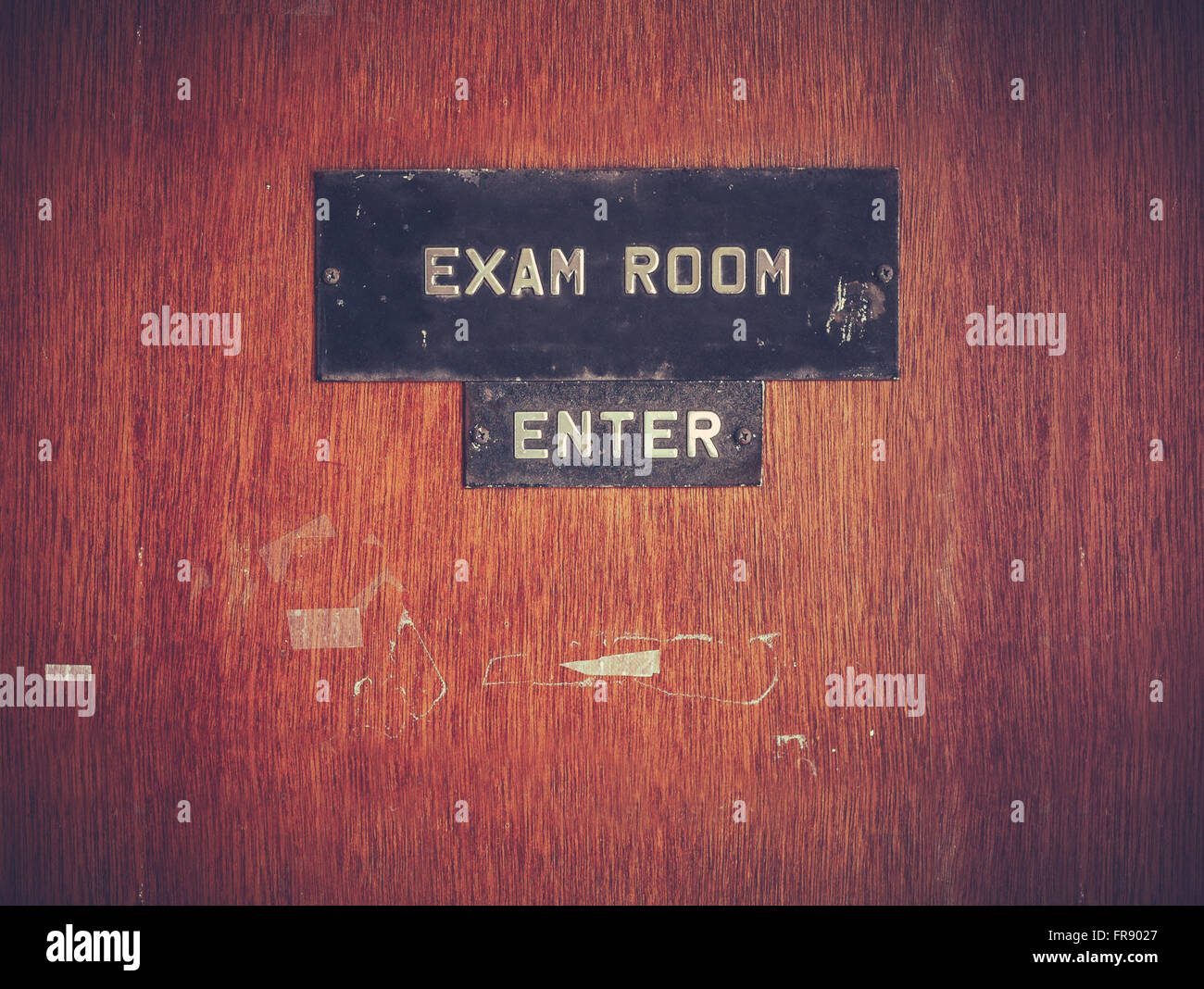 A Grungy Exam Room Door At A Public School In The USA Stock Photo