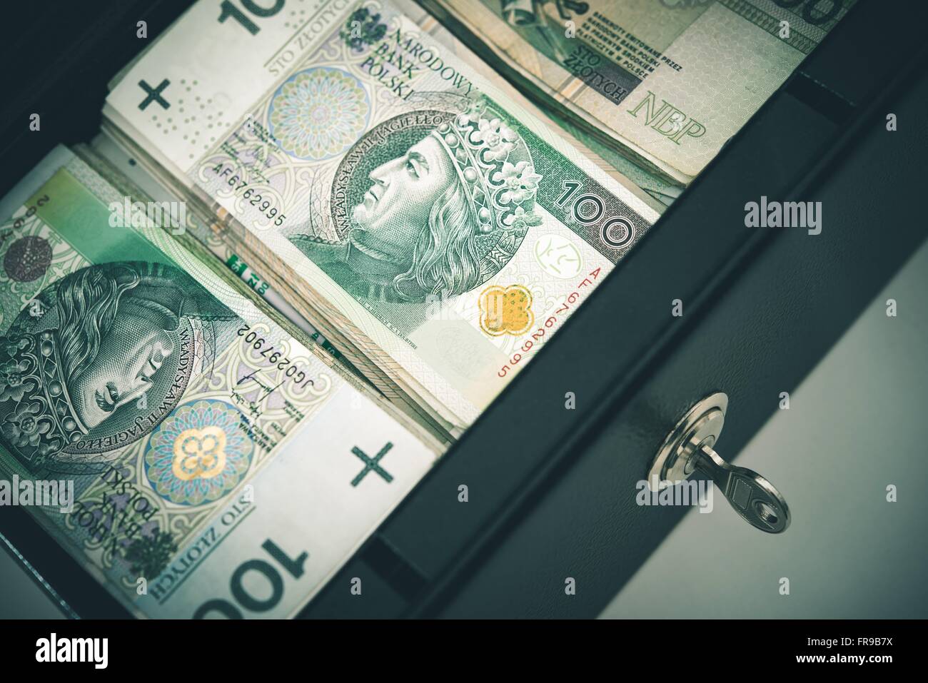 Polish Zloty Cash Money in the Cash Safe Box. Polish One Hundred Zloty