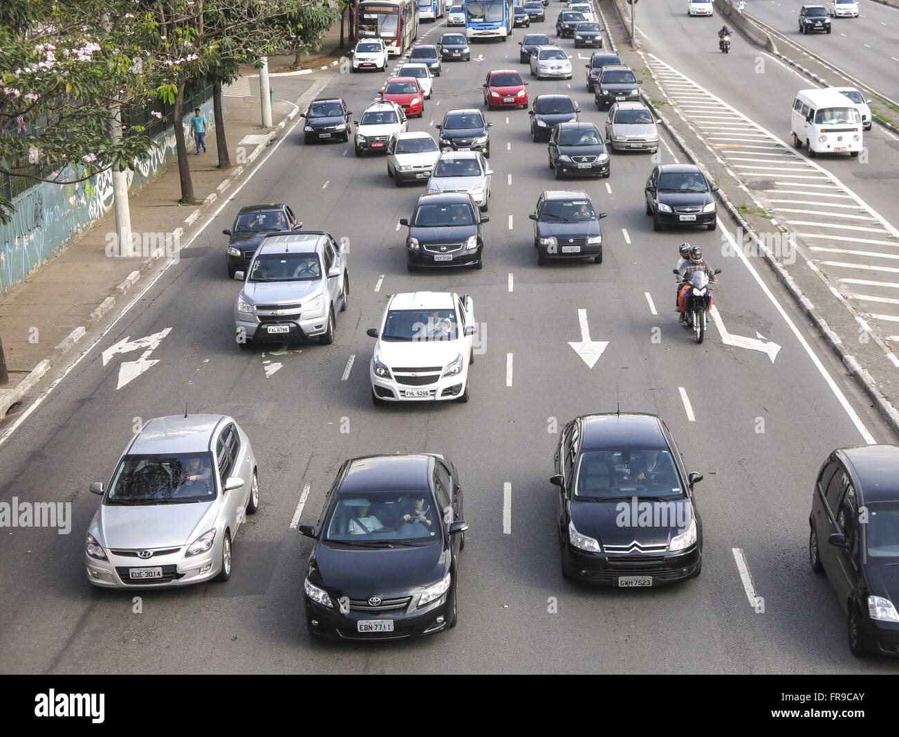 Vehicular traffic in city avenue Stock Photo