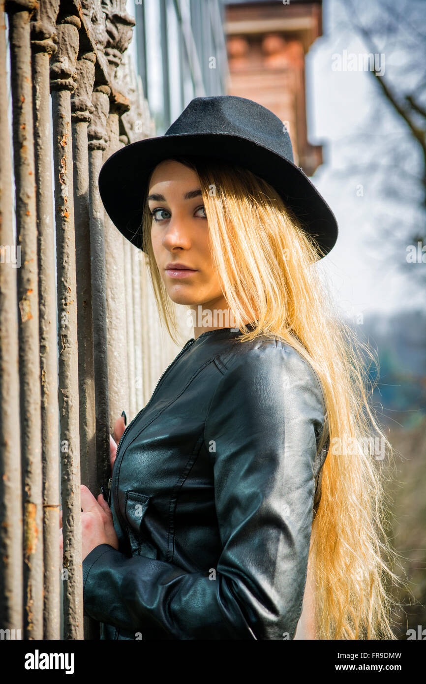 Blonde woman in leather hi-res stock photography and images - Alamy