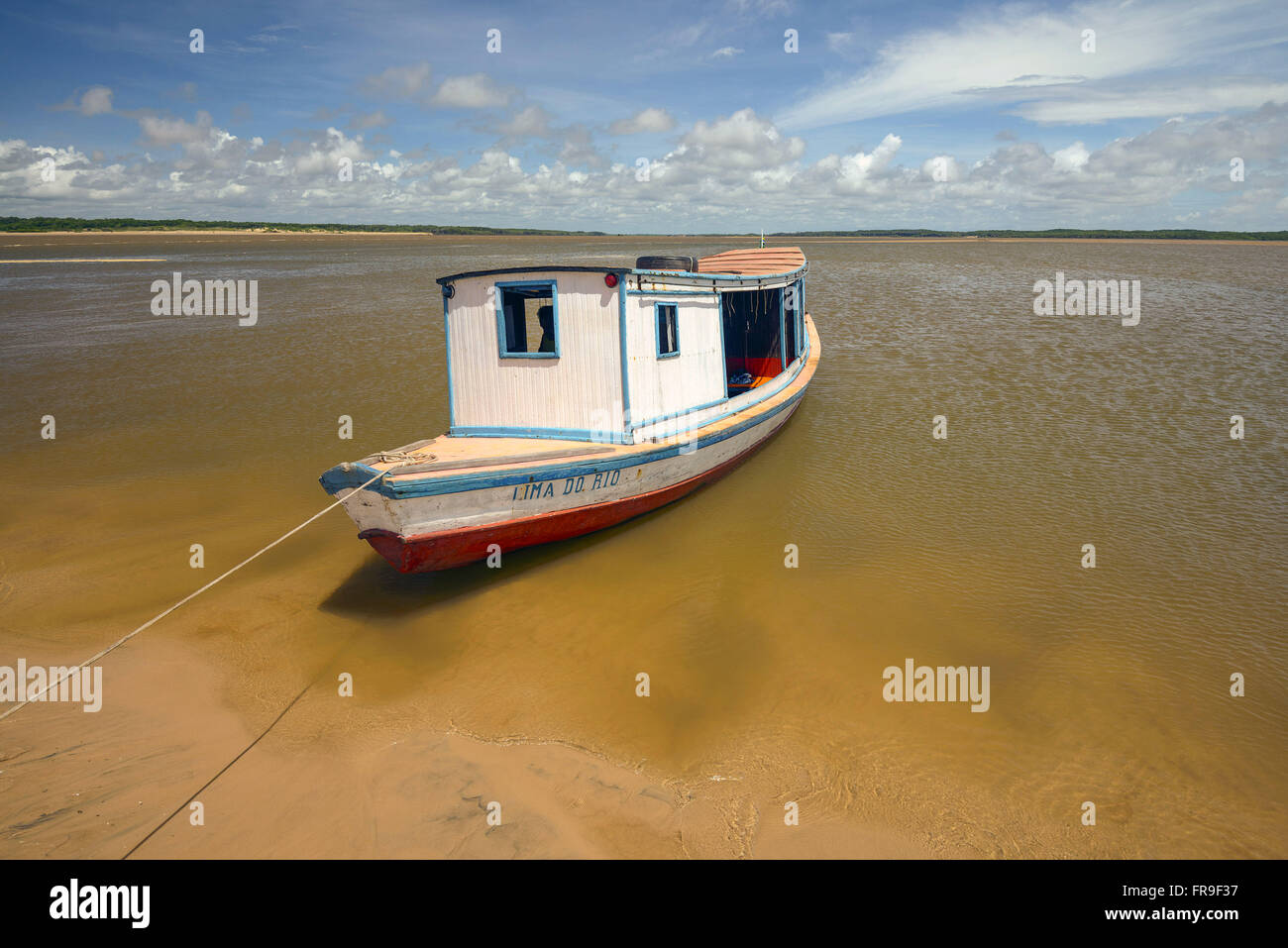 Fishing boat moored on the river Igaraçu - a tributary of the Rio Parnaíba Stock Photo