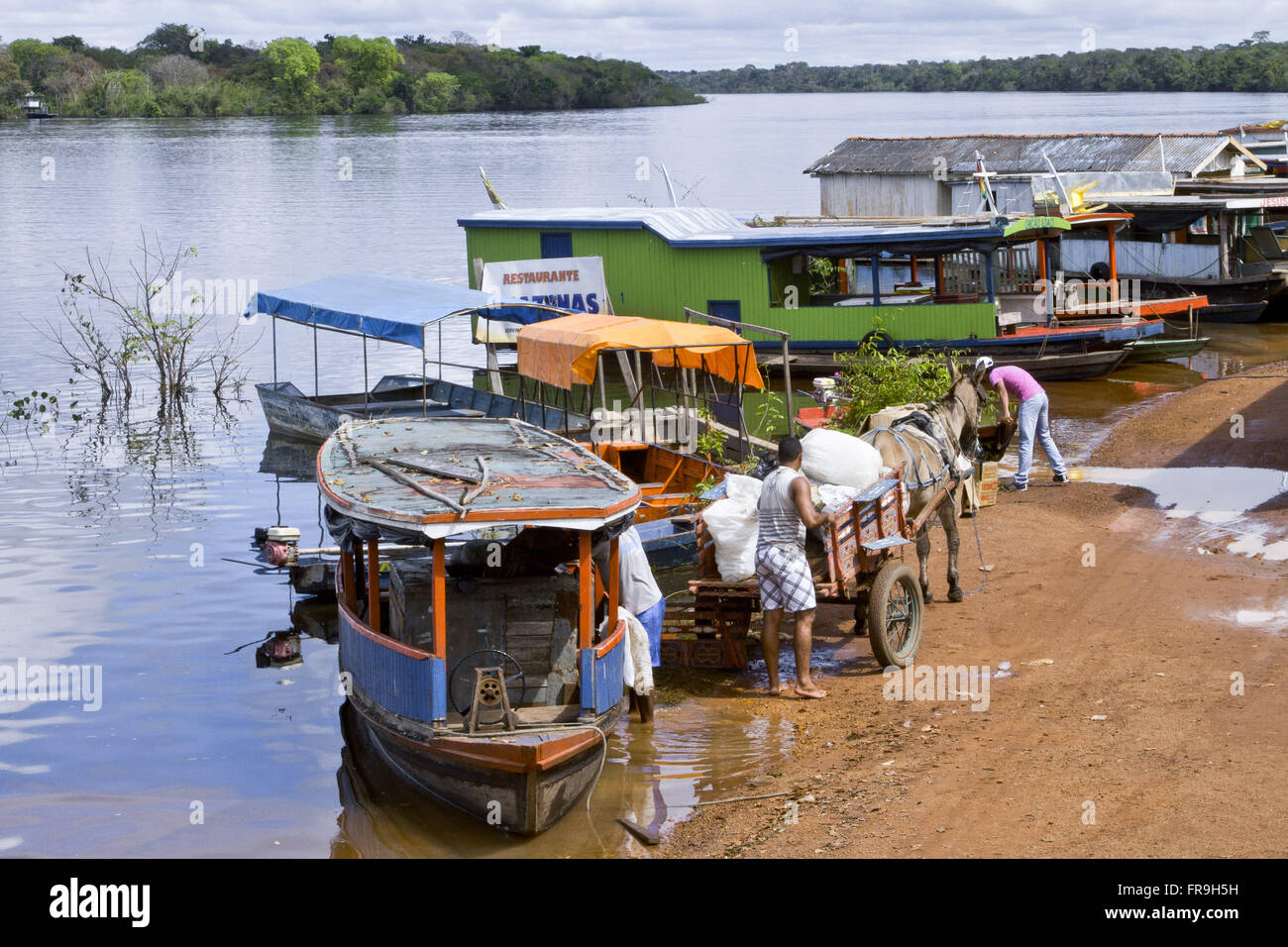 Boats moored in the river port city on the river Guapore Stock Photo