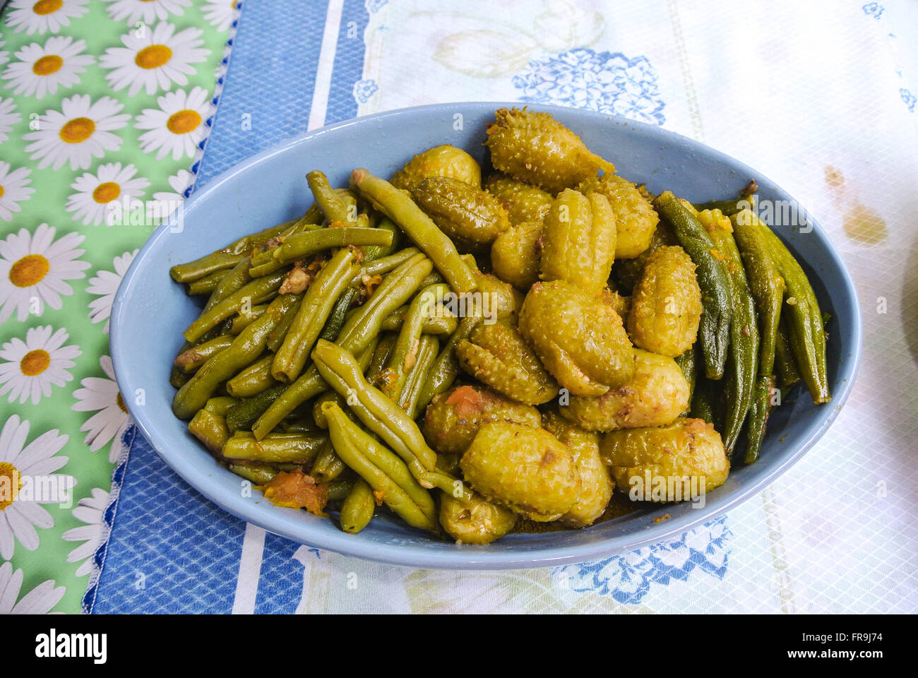 Plate with baked pumpkin and green beans Stock Photo