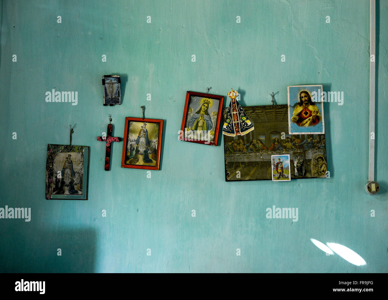 Wall with religious images at home in the rural village - the region Jararaca Stock Photo
