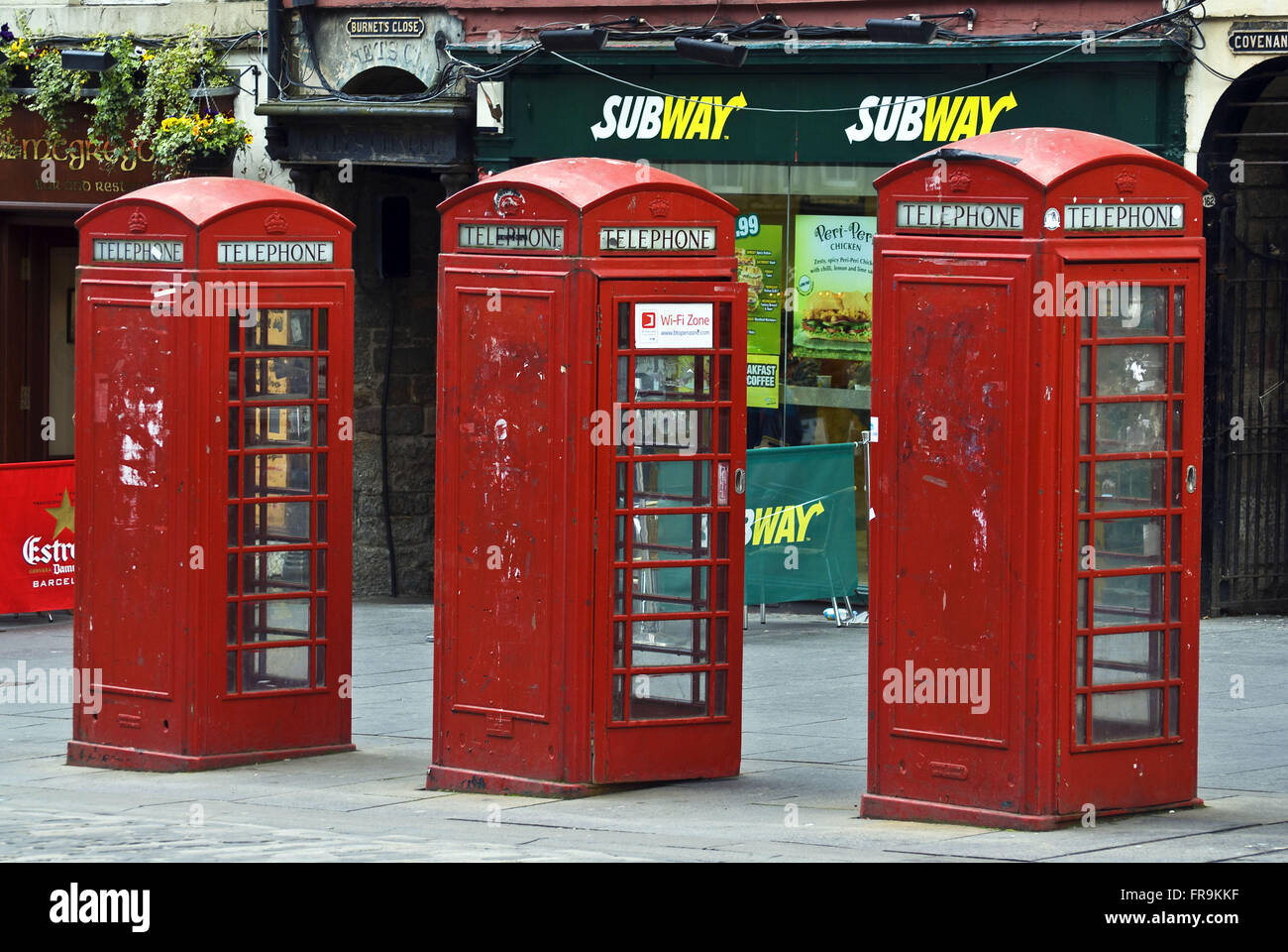 Telephone booths in front of a diner in the city of Edinburgh - Scotland Stock Photo