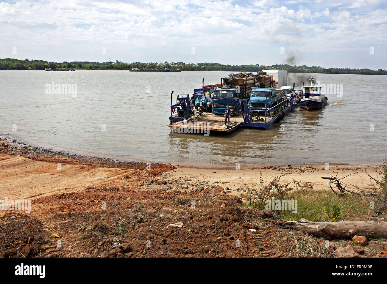 Ferry making the crossing of the River Jacui Stock Photo