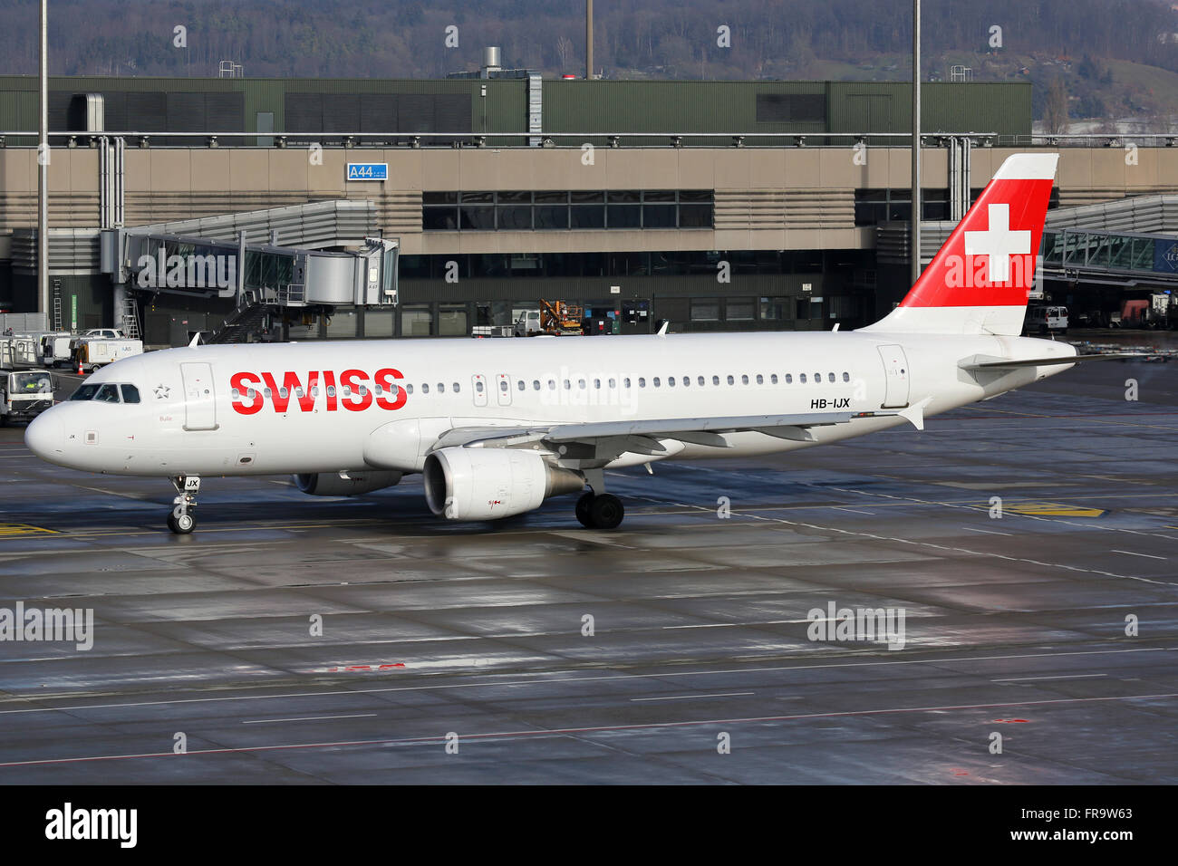 Zurich, Switzerland - January 23, 2016: A Swiss International Air Lines Airbus A320 with the registration HB-IJX taxis at Zurich Stock Photo