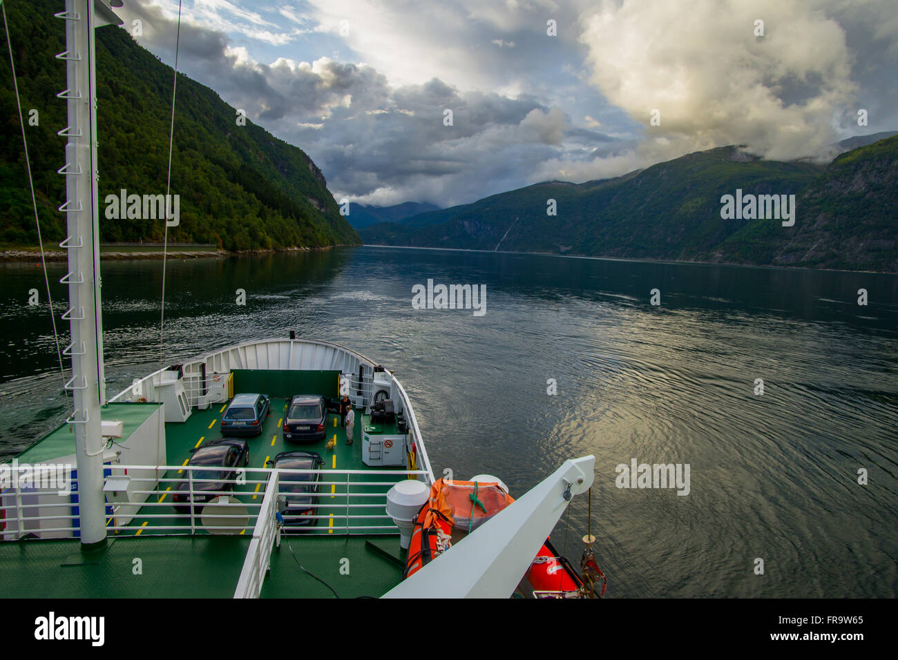 View from the ferry on Norwegian fjord. In order to get from Geiranger to Ålesund Stock Photo