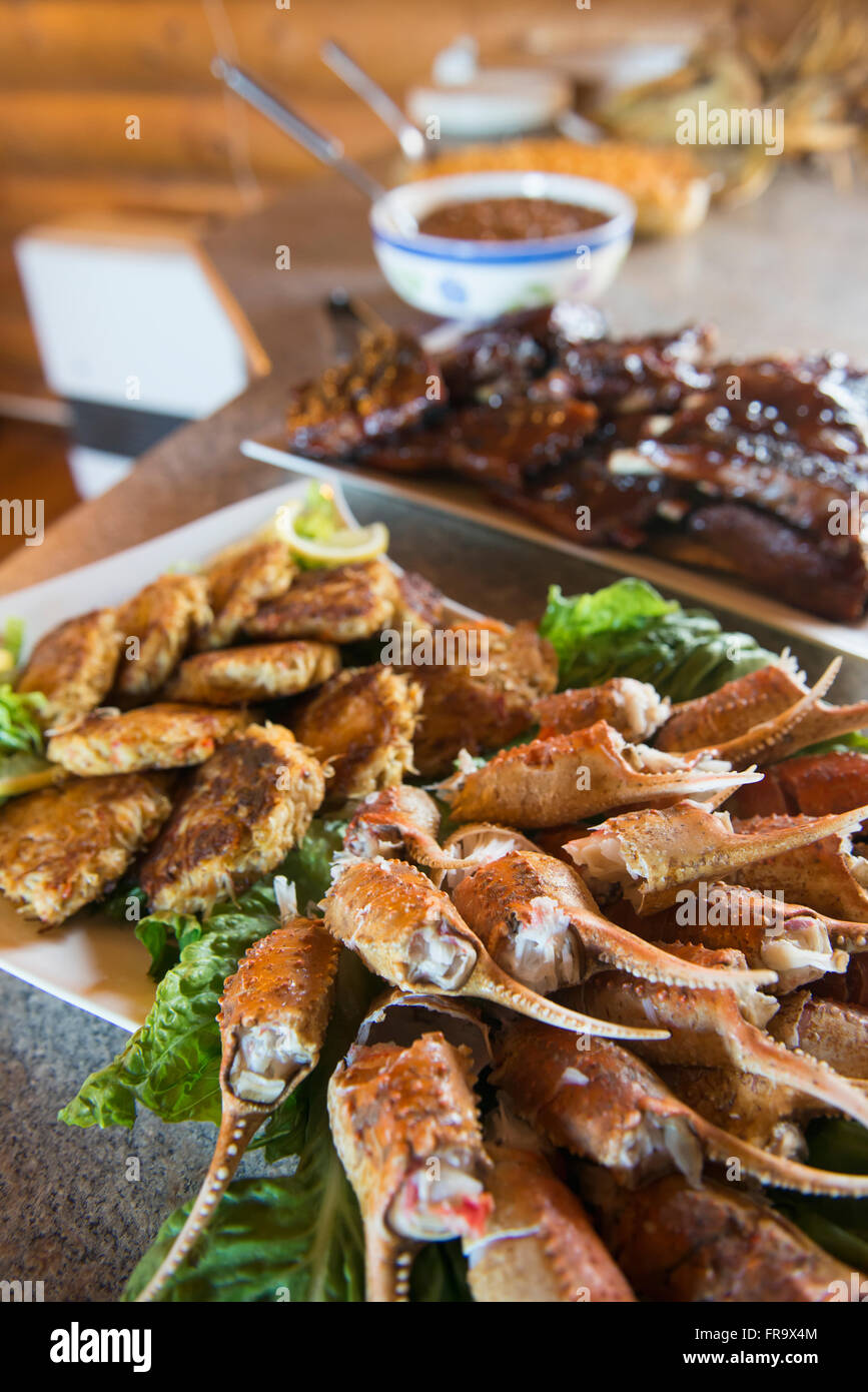 A Spread Of Crab Claws, Crab Cakes And Barbecue Ribs Awaits Guests At The Katmai Wilderness