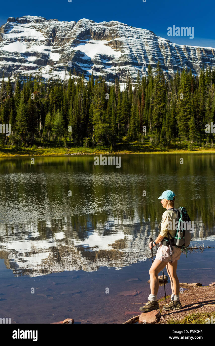 Female standing on lake hi-res stock photography and images - Alamy