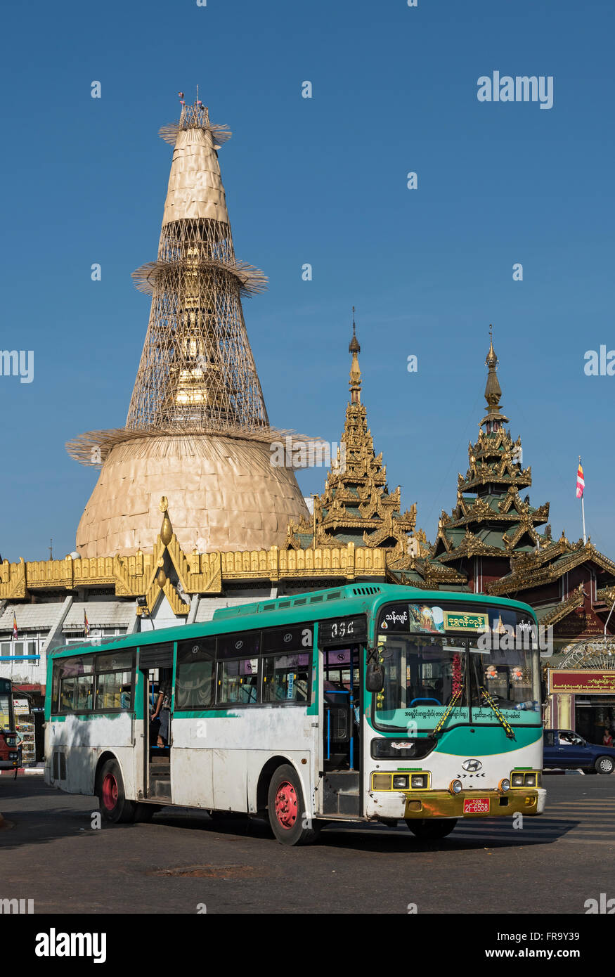 Municipal bus outside Sule pagoda in Yangon (Rangoon), Burma (Myanmar) Stock Photo