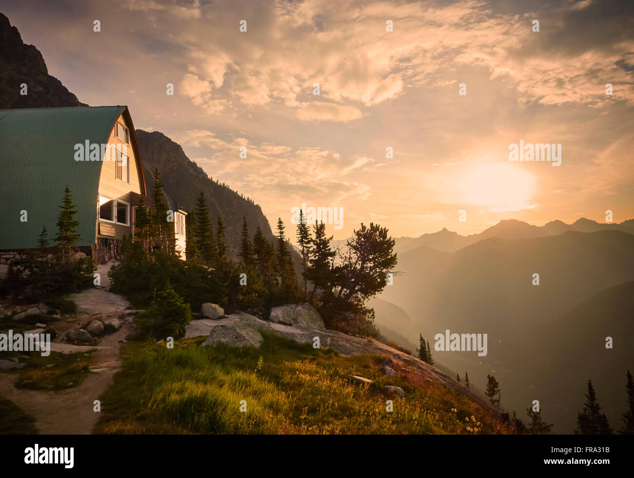 Sunrise at the Alpine Club of Conrad Kain Hut in the Bugaboos Provincial Park; British Columbia, Canada Stock Photo
